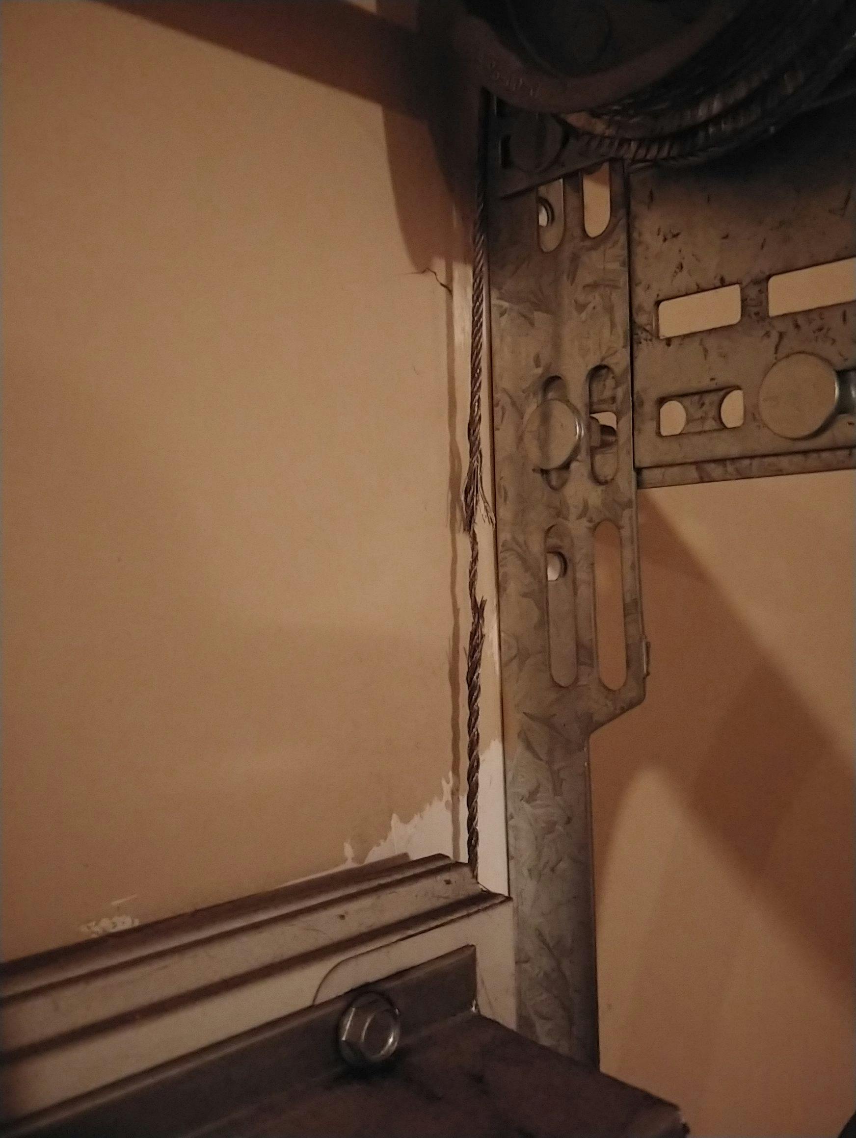 a garage door in need of repair