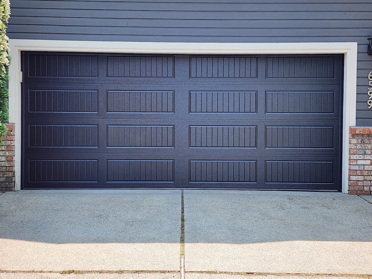 a 16'x7' Hormann 3400 garage door in North Delta