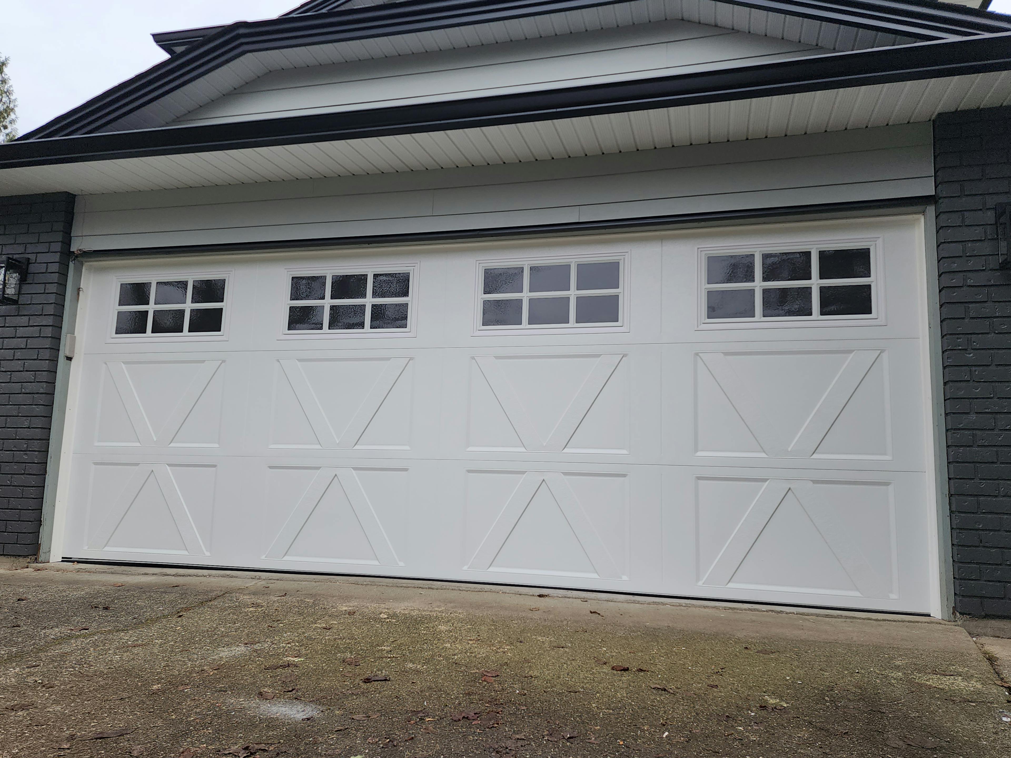 A White Garage Door Installed in Surrey, BC