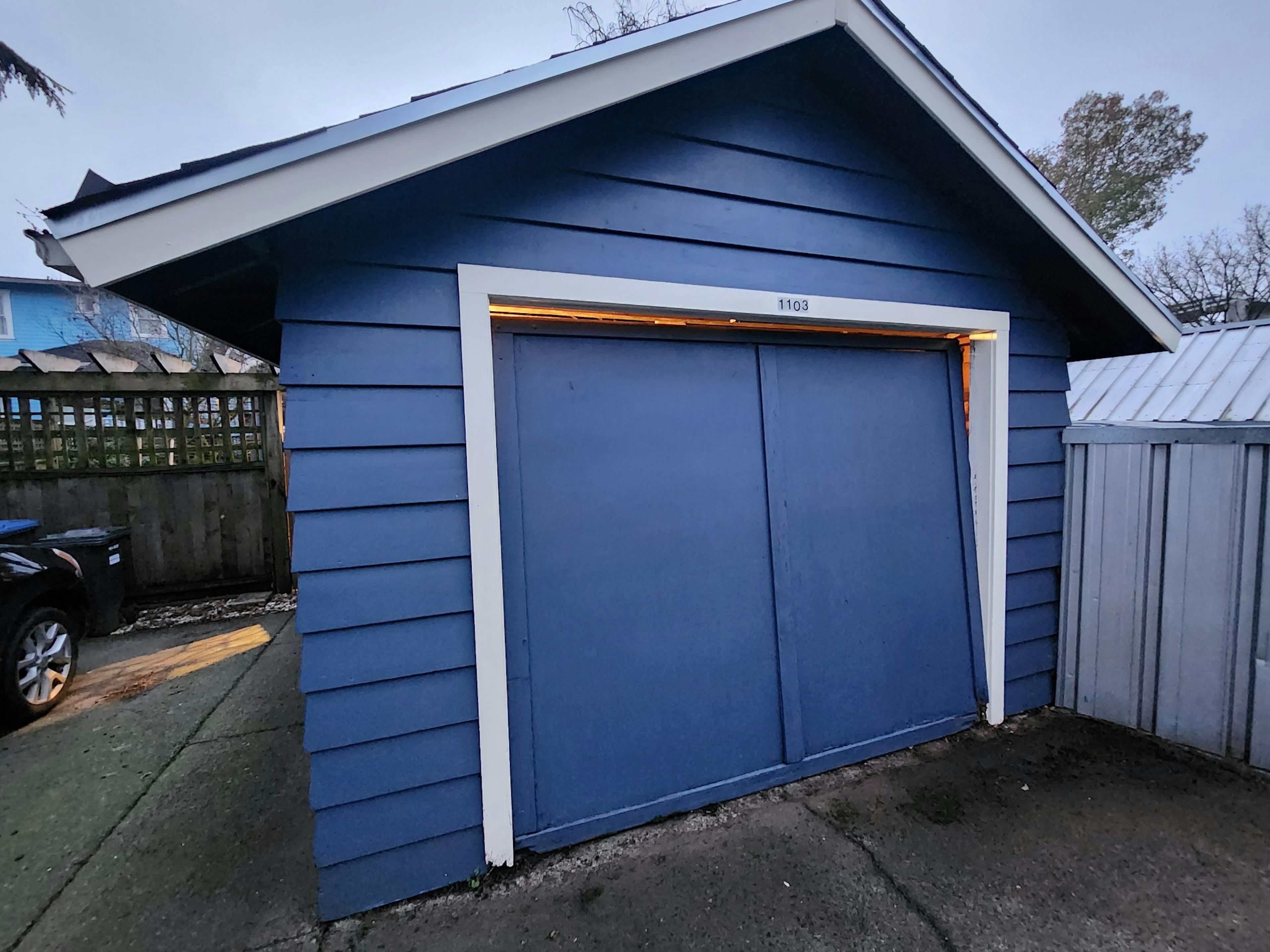 Lions Gate Garage Doors LTD replaced an old garage door with a new one.