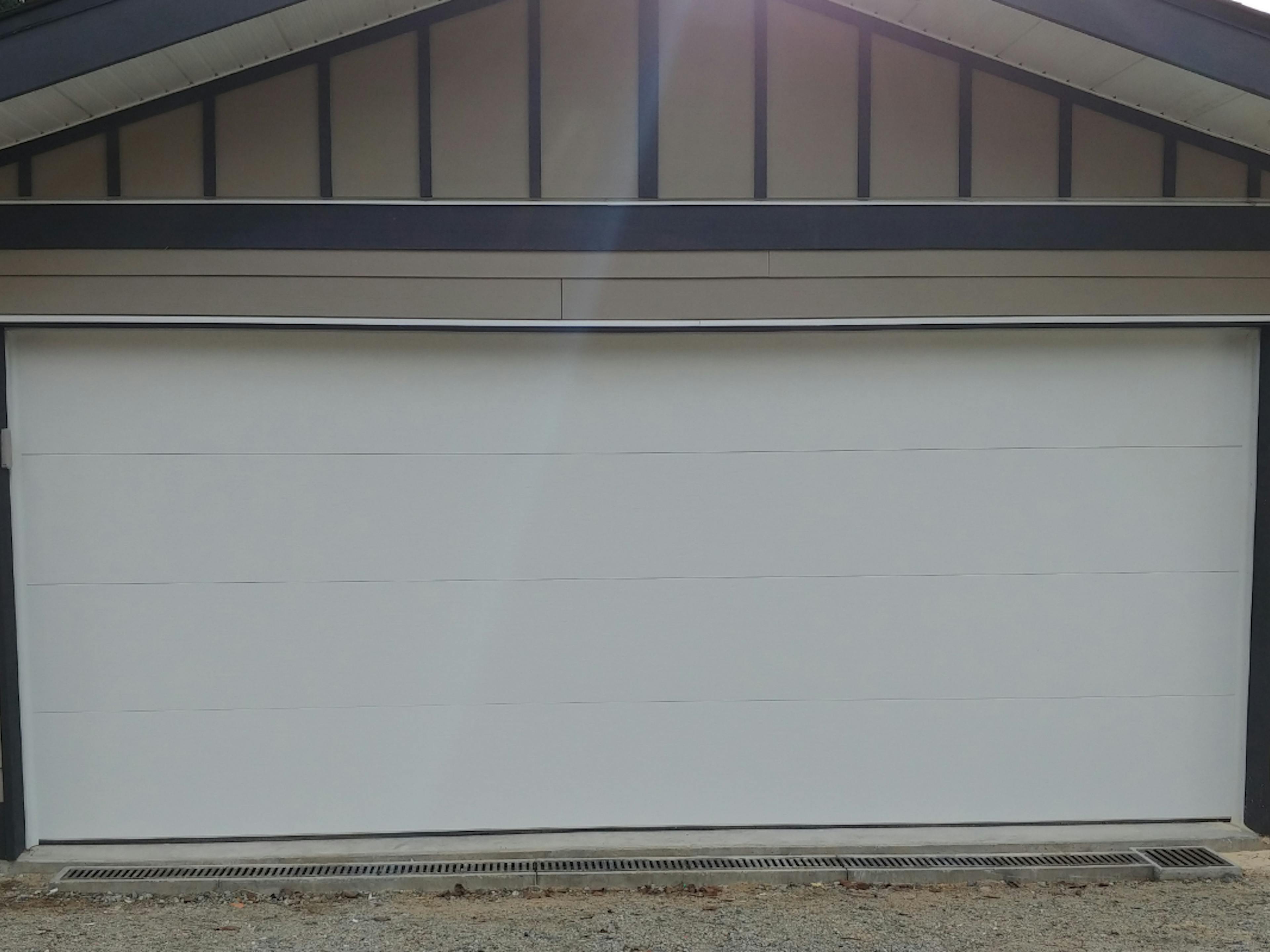 Fresh white wide garage door