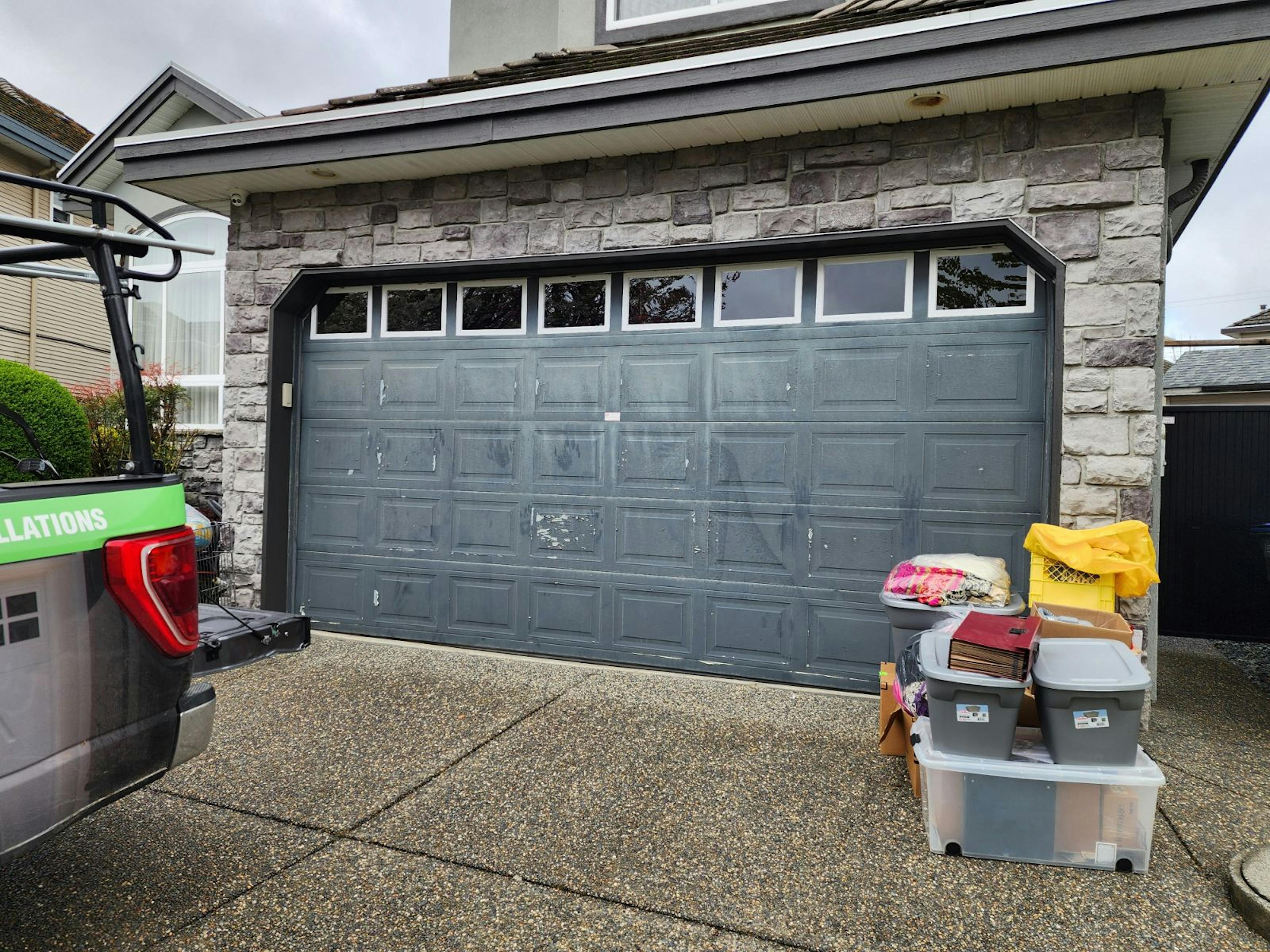 dingy old garage door to be replaced