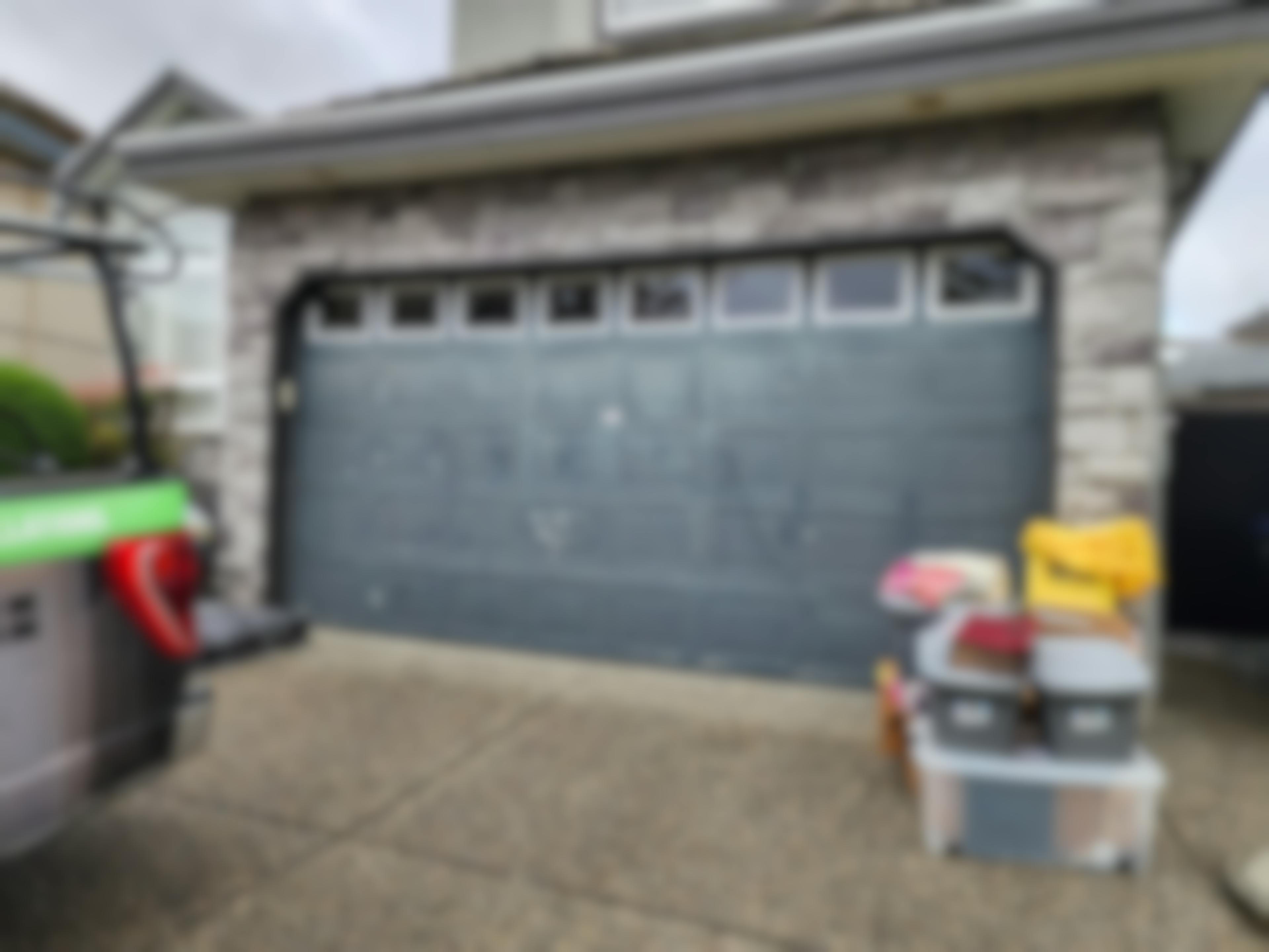 dingy old garage door to be replaced