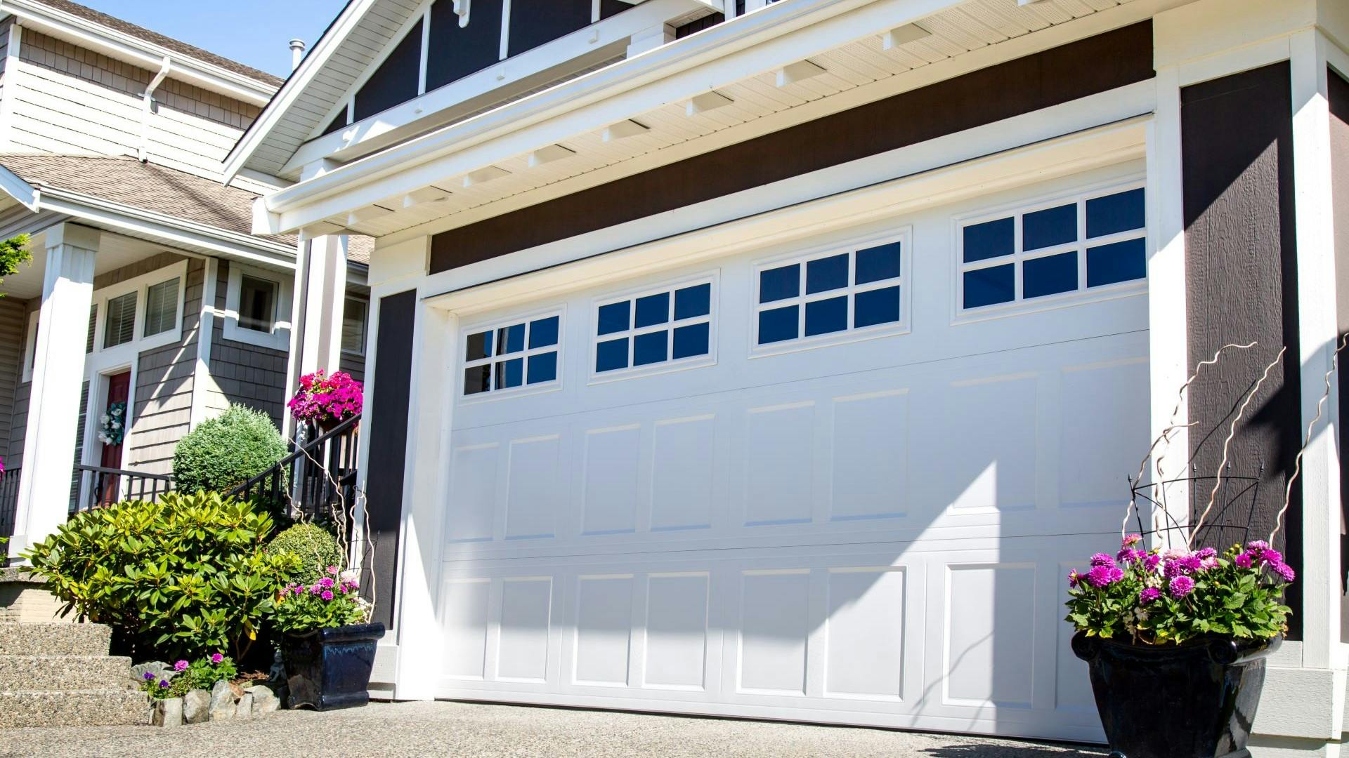 White garage door with glass pannels at the top