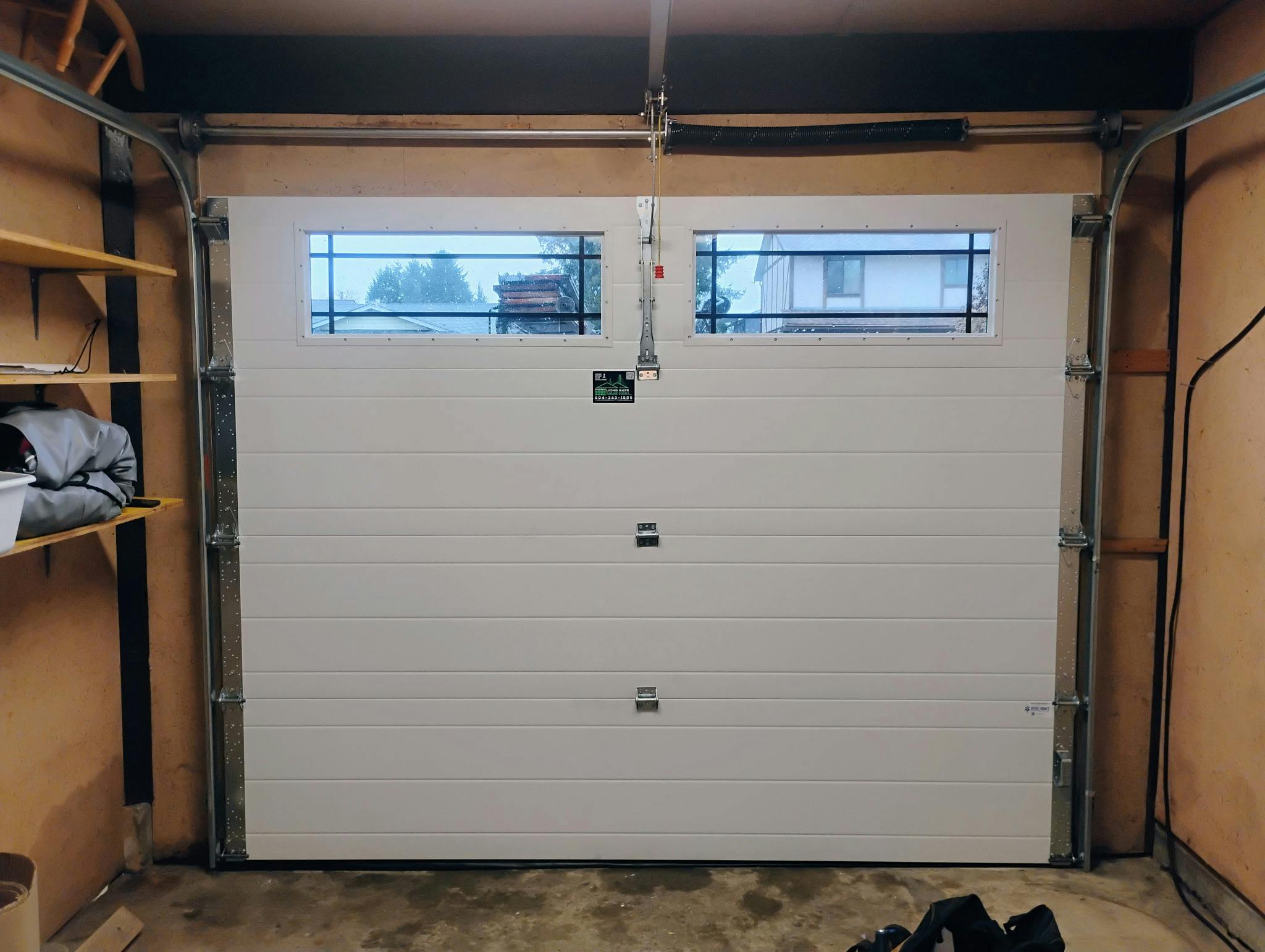 Inside of SteelCraft Ranch-Craft in Charcoal with double pane clear glass windows in the top section