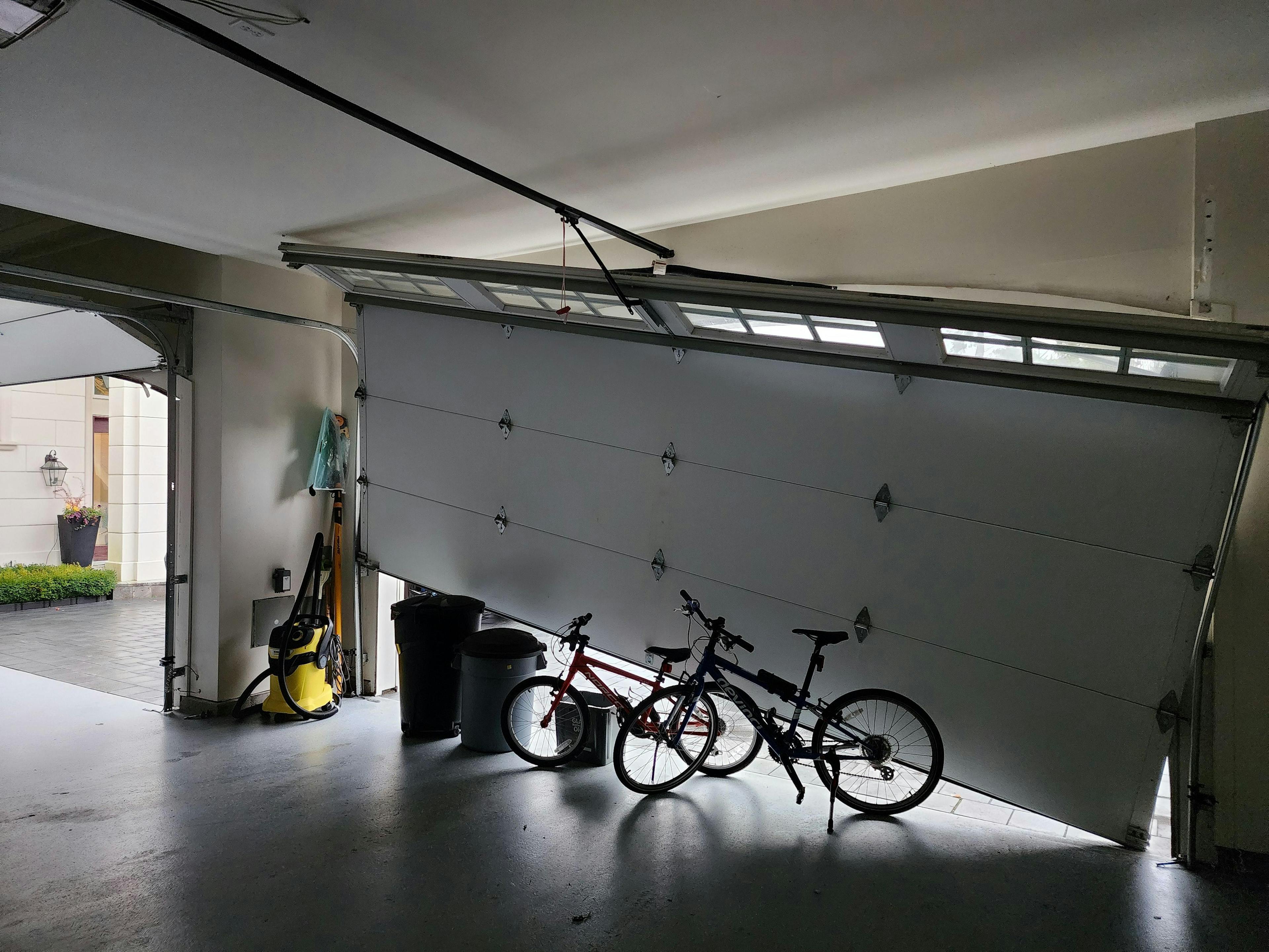 Garage door about to be repaired by Lions Gate Garage Doors (inside view)