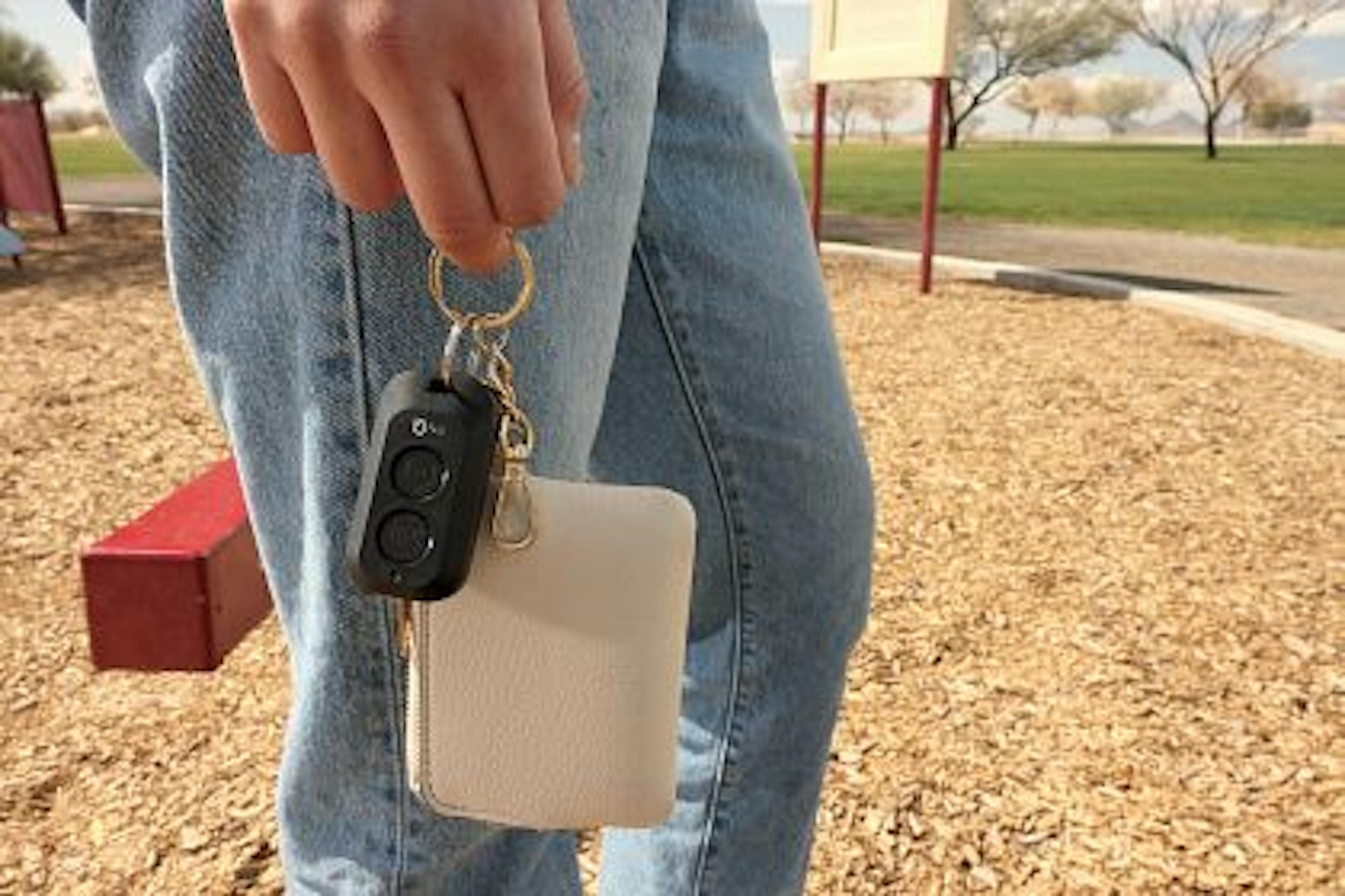 LiftMaster L932M 2-Button Keychain Remote held in hand