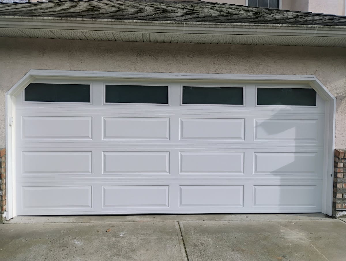 Read Garage Door Installation, Surrey, Portfolio 110 new Hormann Therma Tech 3400 white garage door