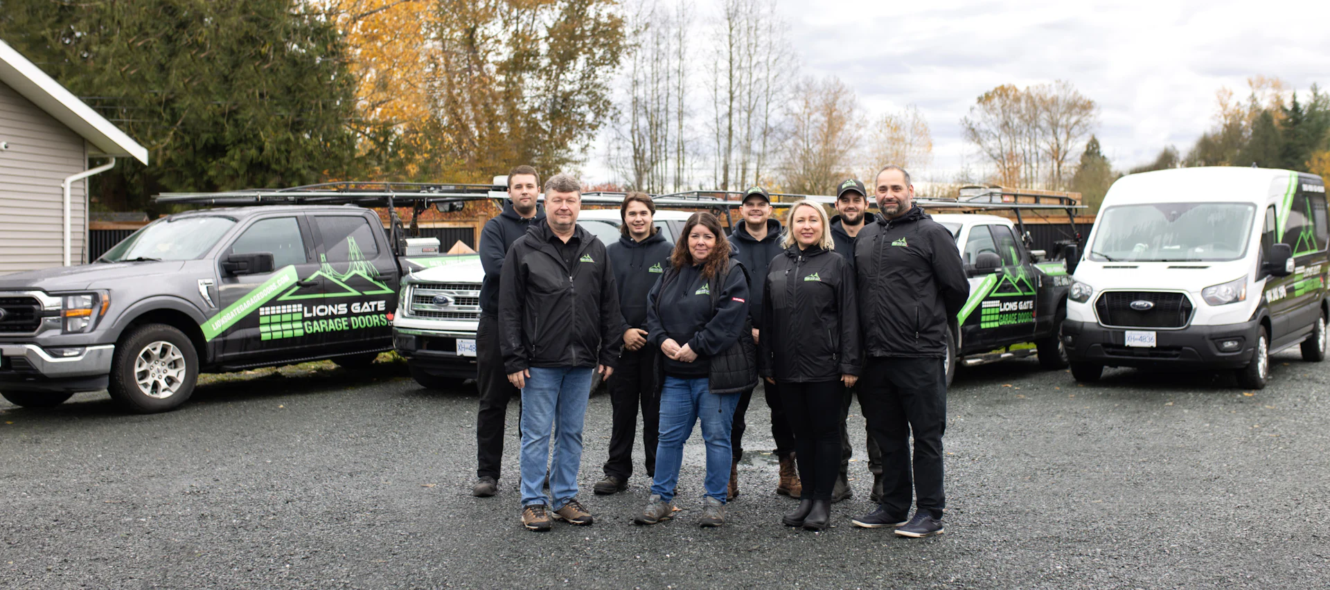 Lions Gate Garage Doors team and service vehicles ready for residential garage door work in Metro Vancouver