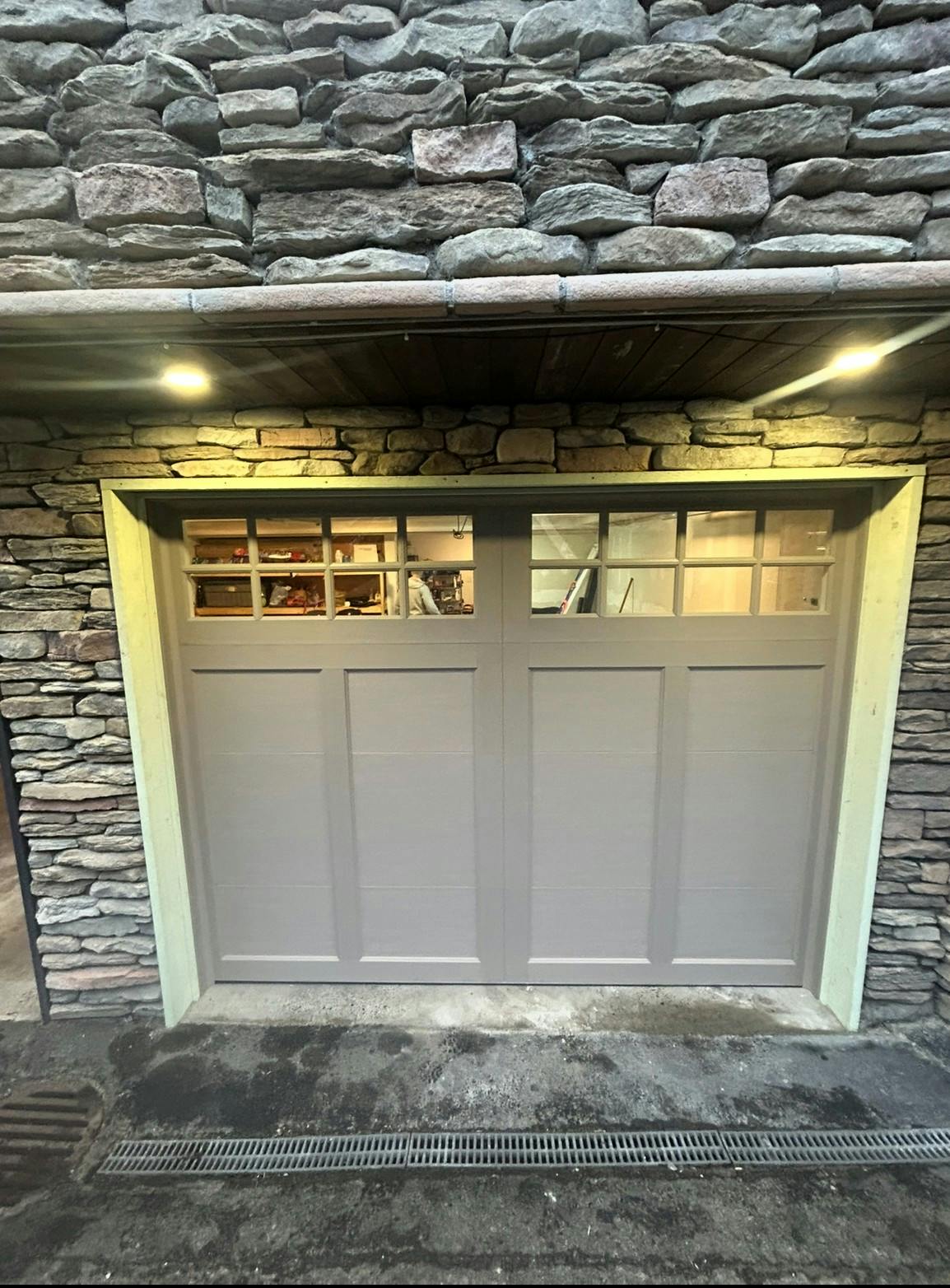 A premium 9x7 Clopay Coachman CG12 garage door