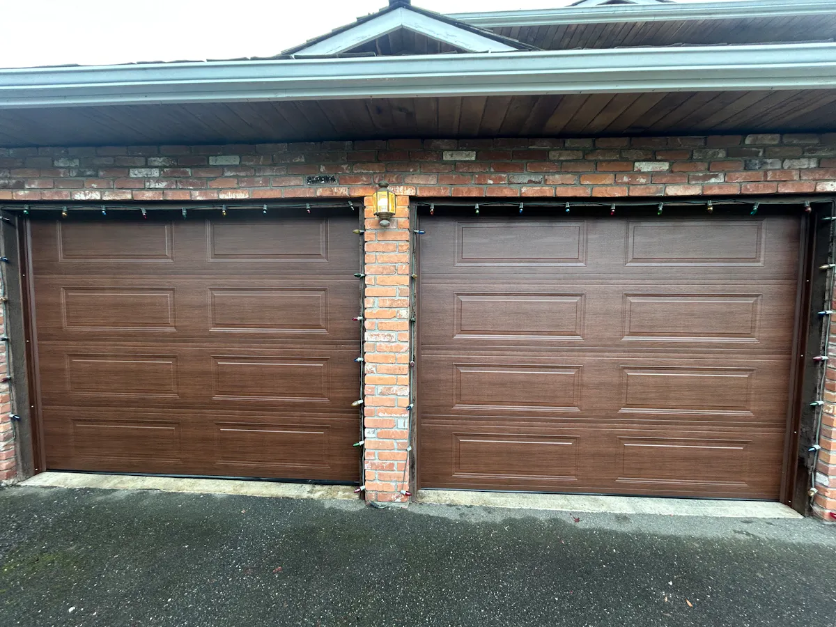 Read Garage Door Installation, Burnaby, Portfolio 115 Two 9x7 Steel-Craft Ranch-Craft in Walnut