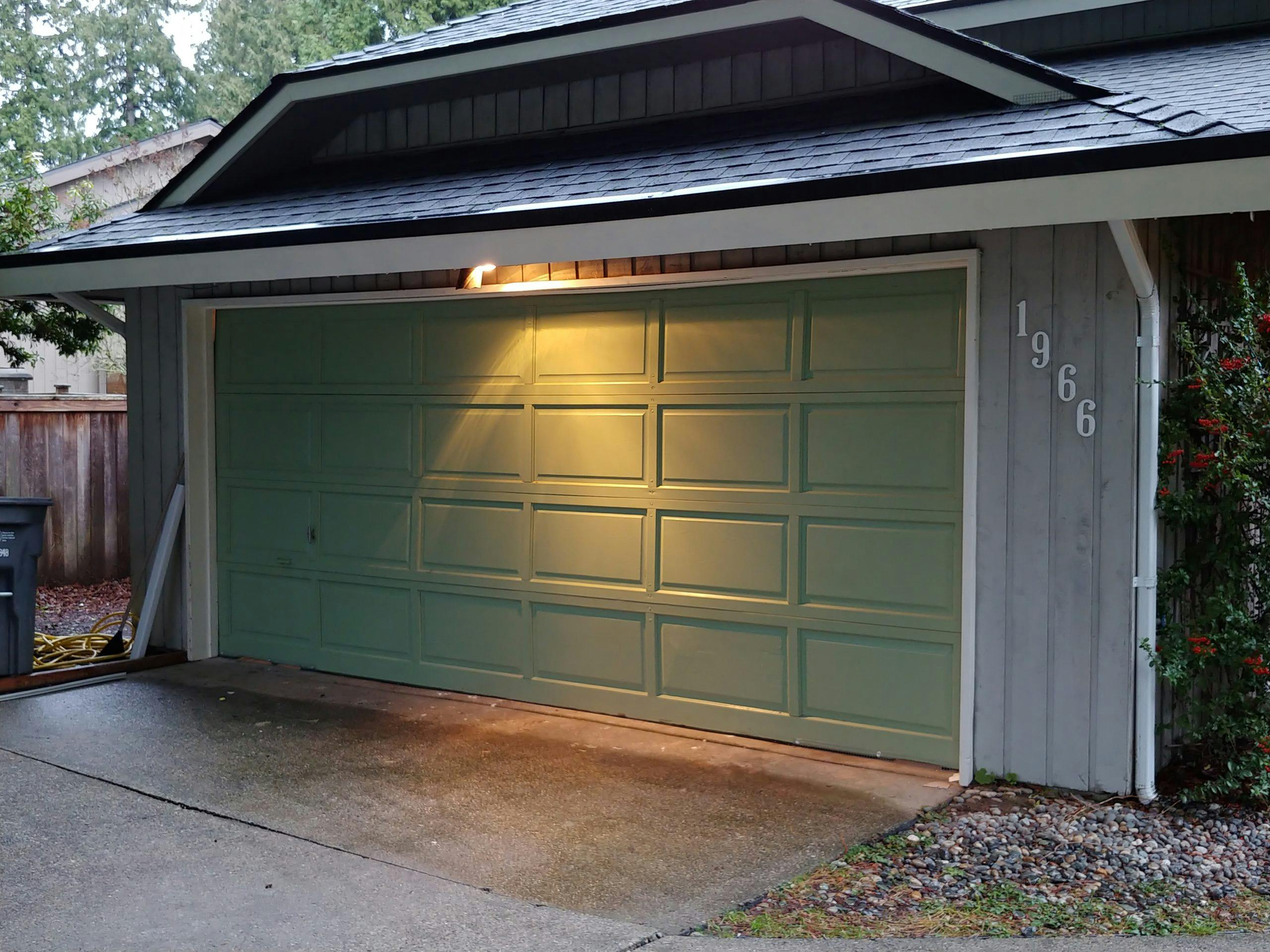 A green garage door
