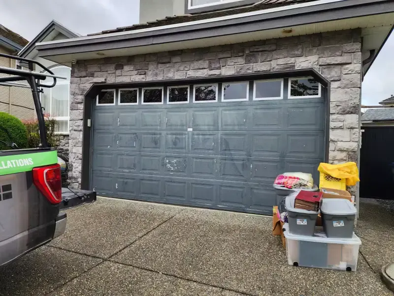 New insulated garage door installation in Surrey