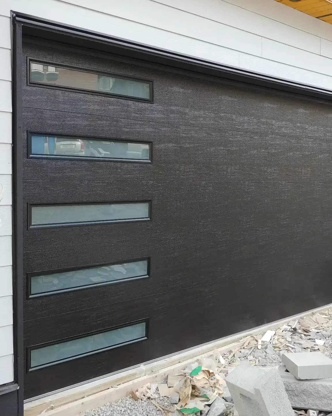 Garage door opener installation with remote and keypad accessories