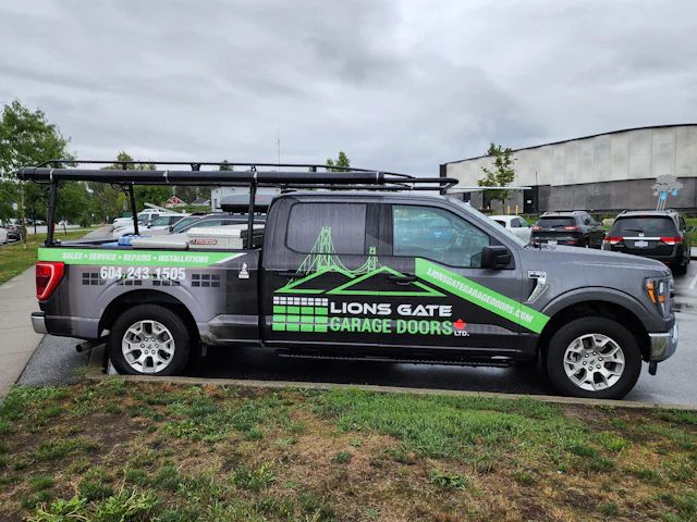 Garage door technician performing repair