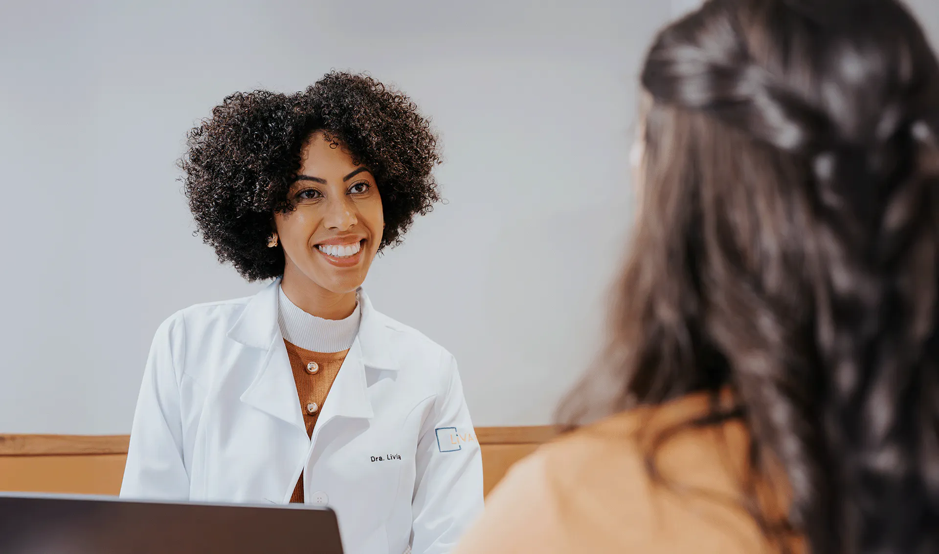 Profissional com paciente