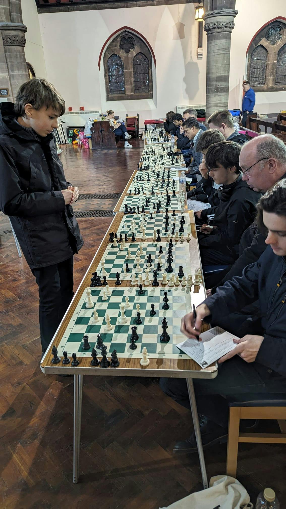 Congratulations to Andrew, pictured here deep in concentration against IM Svyatoslav