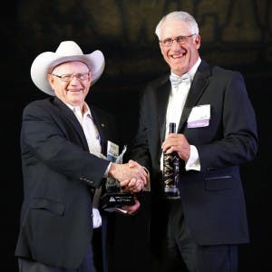 Billy Perrin honored by Shawn Madden with Industry Icon award