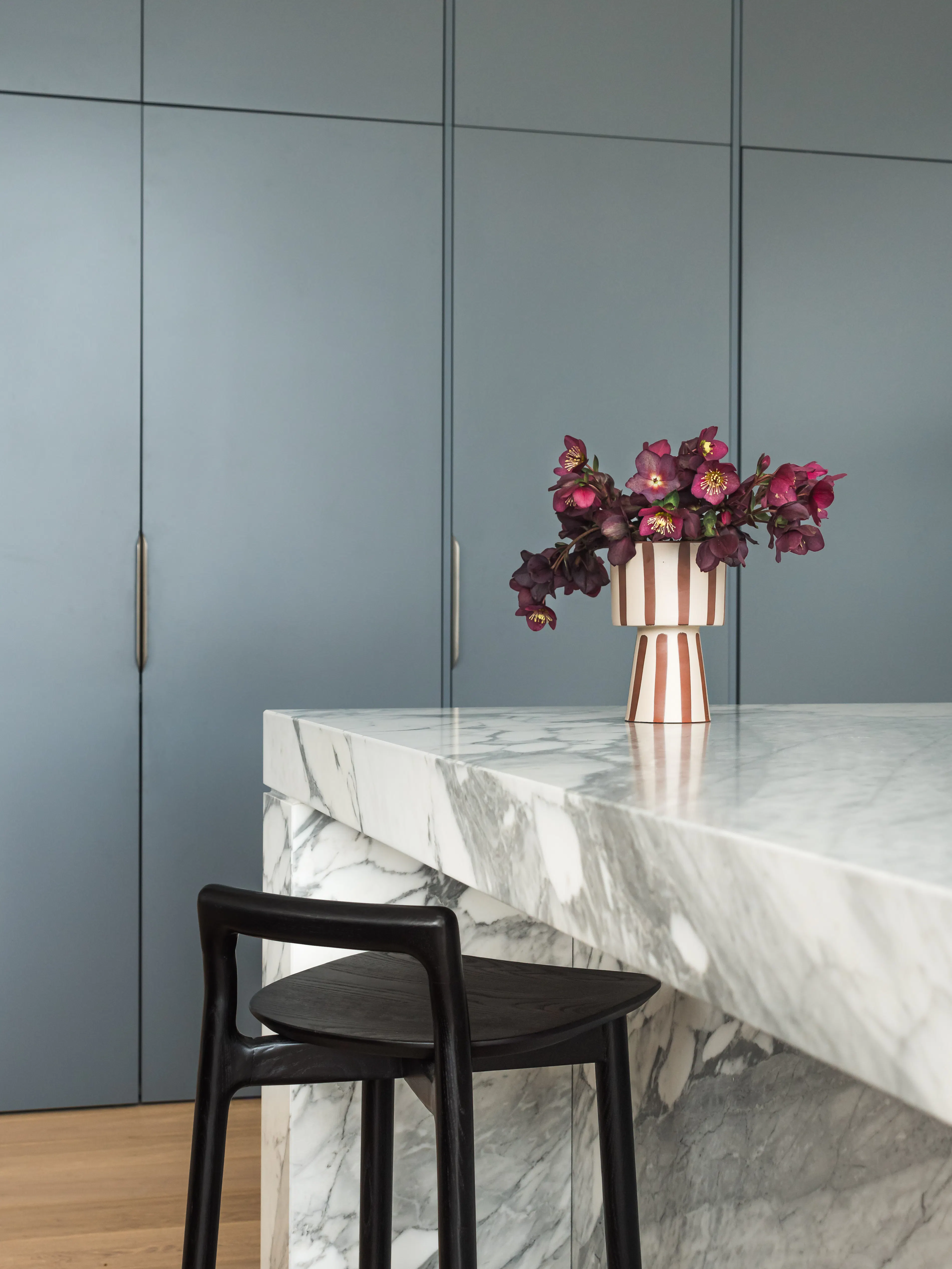 Lo and Co handle in a blue kitchen