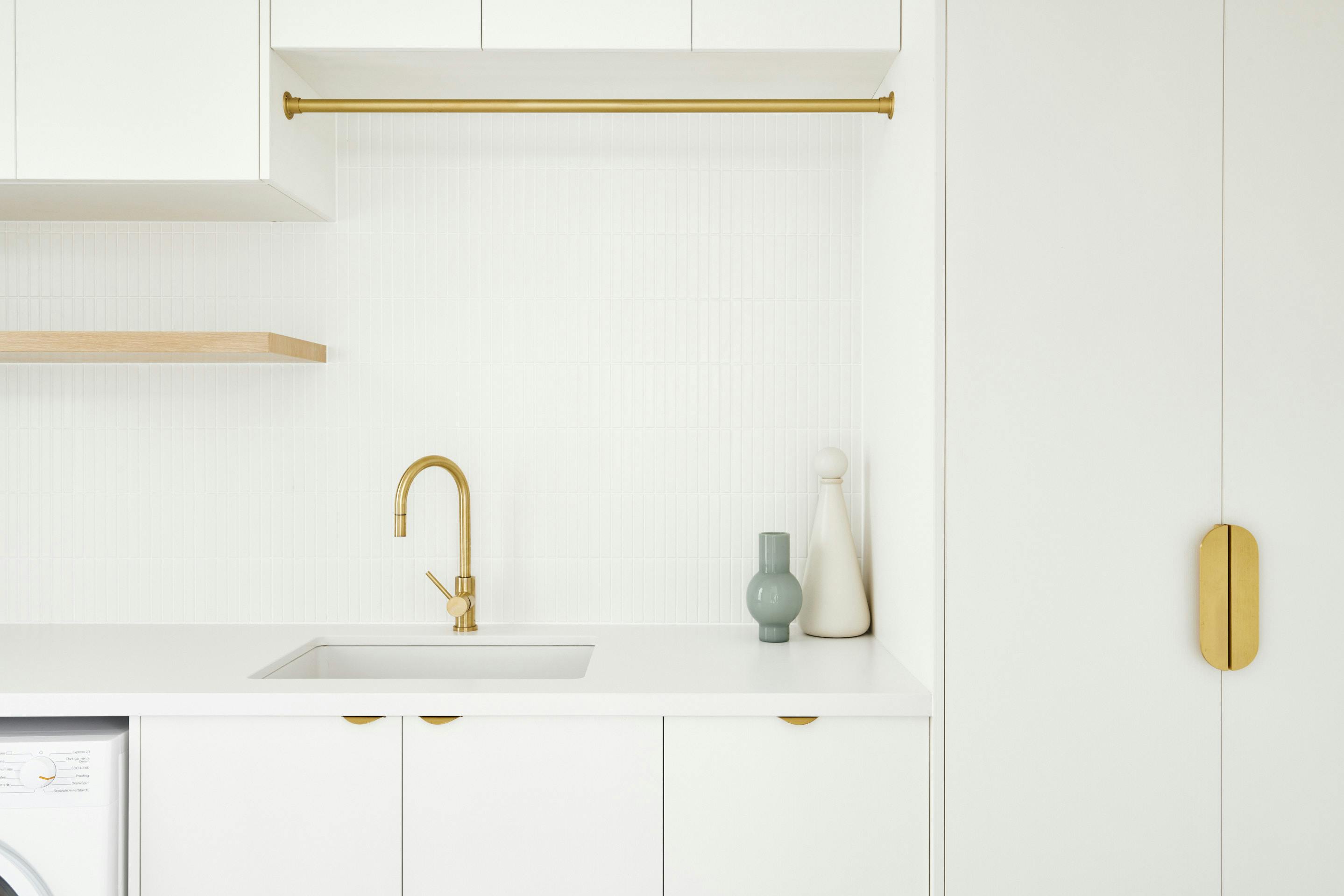 Lo and Co kitchen with lip pull handles in brass