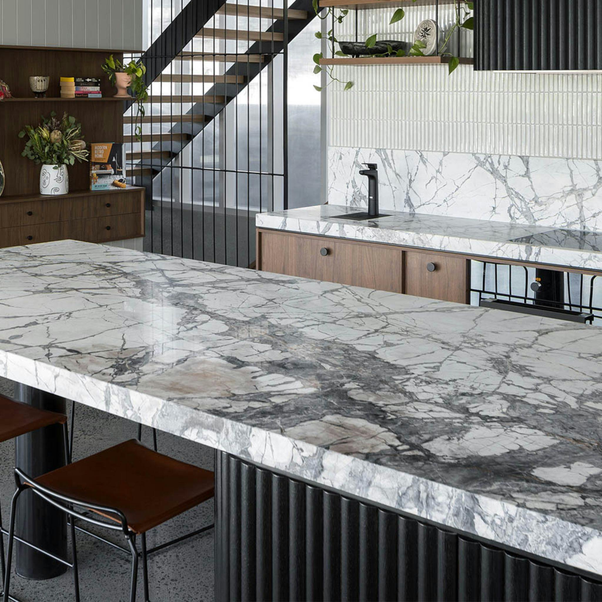 Lo and Co marble kitchen with black knobs