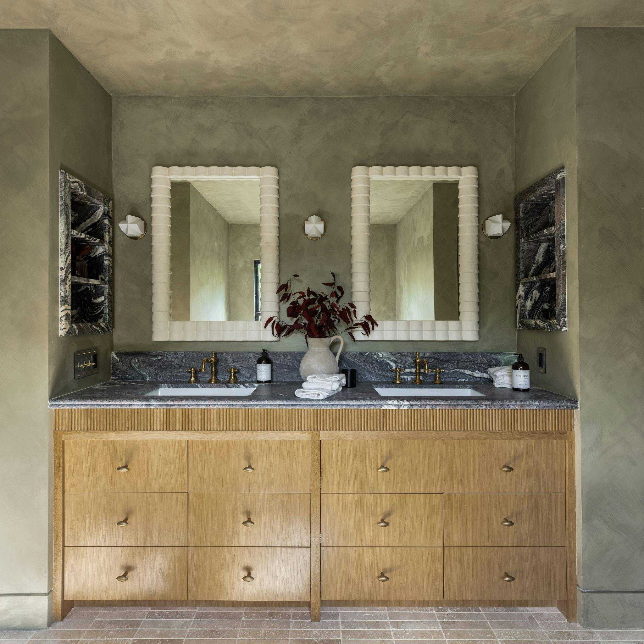 A kitchen with almond shaped knobs on a wooden cabinet
