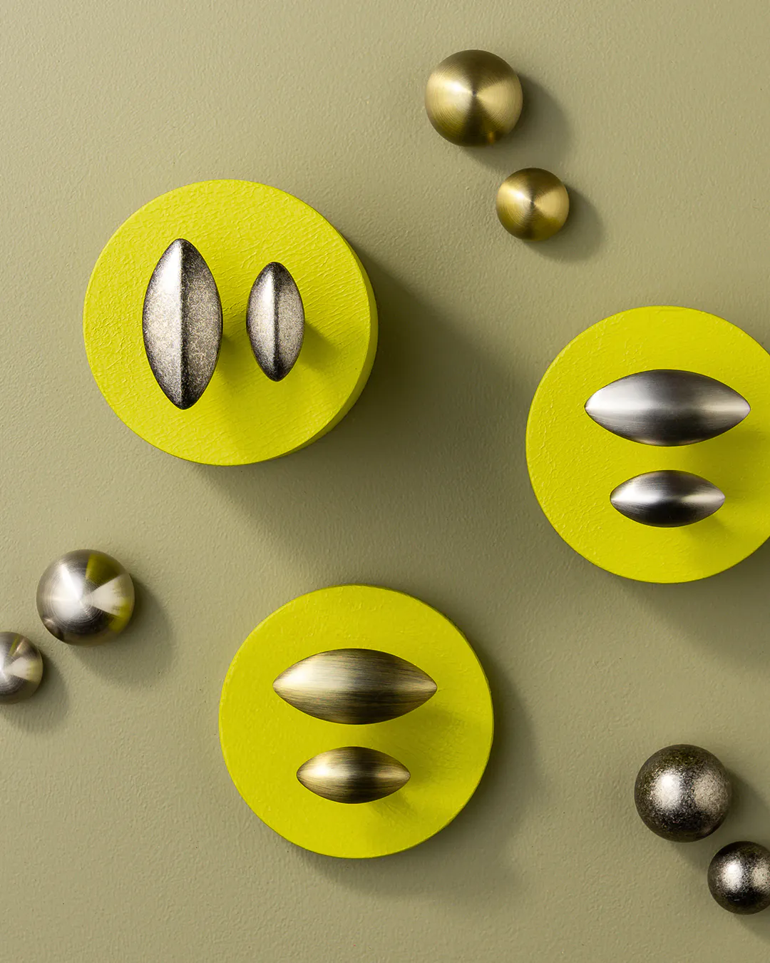 Lo & Co Almond and Sphere knobs in aged brass