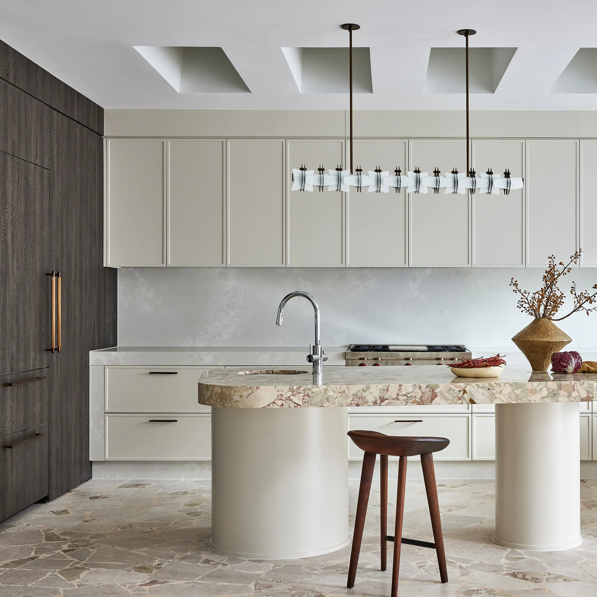 lo and co interiors linear appliance pull bronze on integrated fridge in clement kitchen project