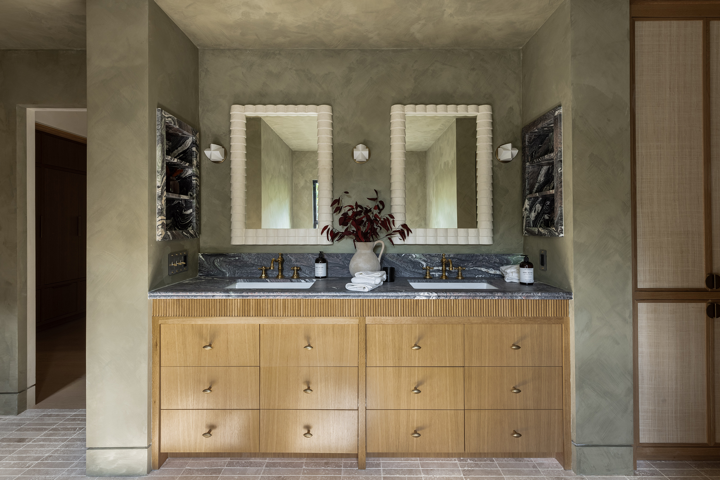 lo and co interiors samaha studio almond knobs bathroom cabinets