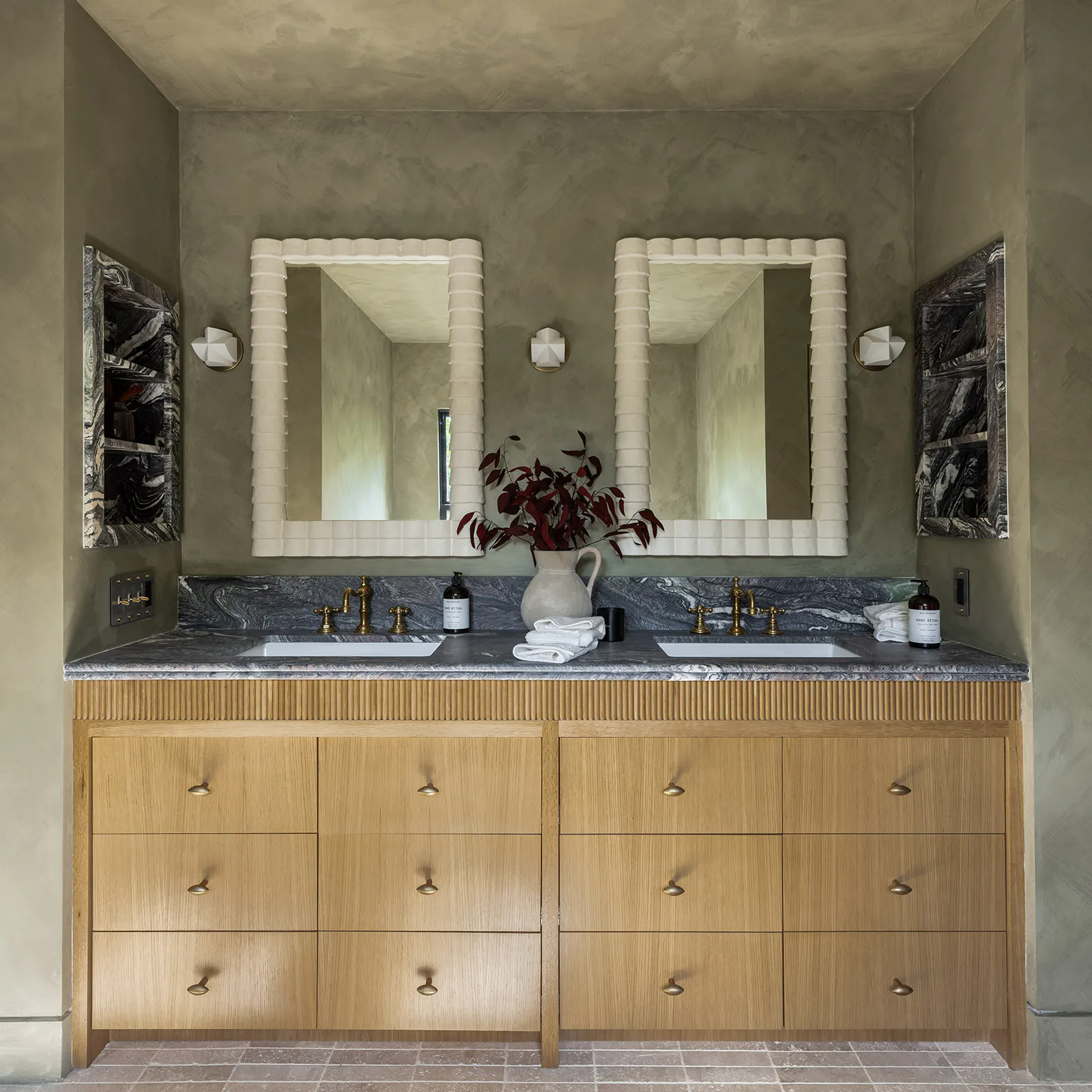 lo and co interiors samaha studio almond knobs bathroom cabinets