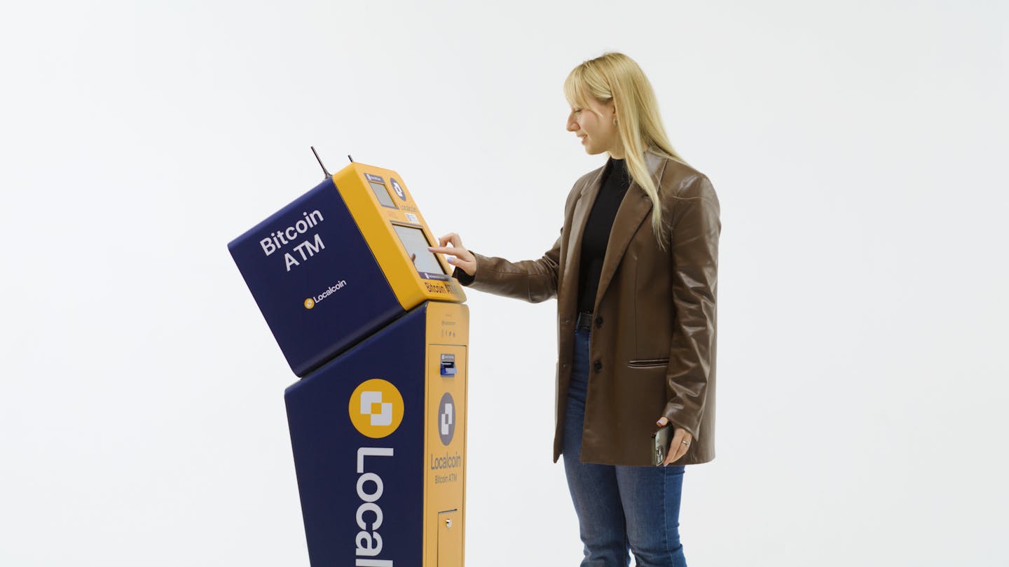 User using a Localcoin Buy ATM