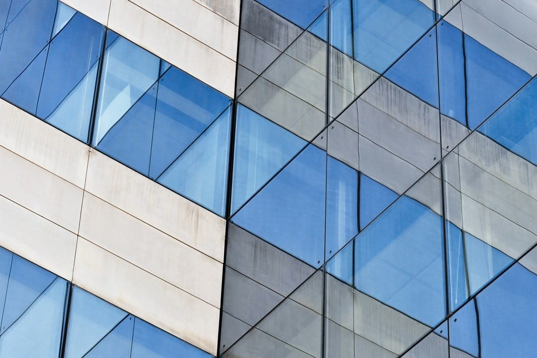 Blue windows reflecting themselves