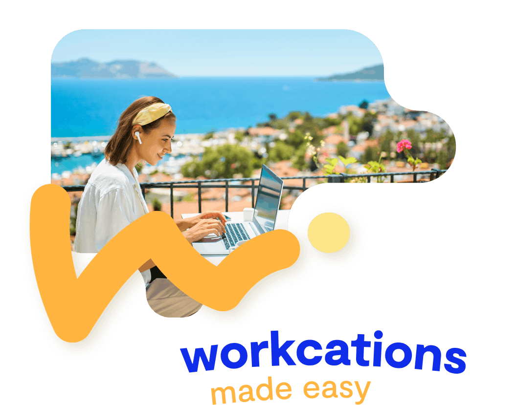 Woman on a laptop in a sunny, seaside location