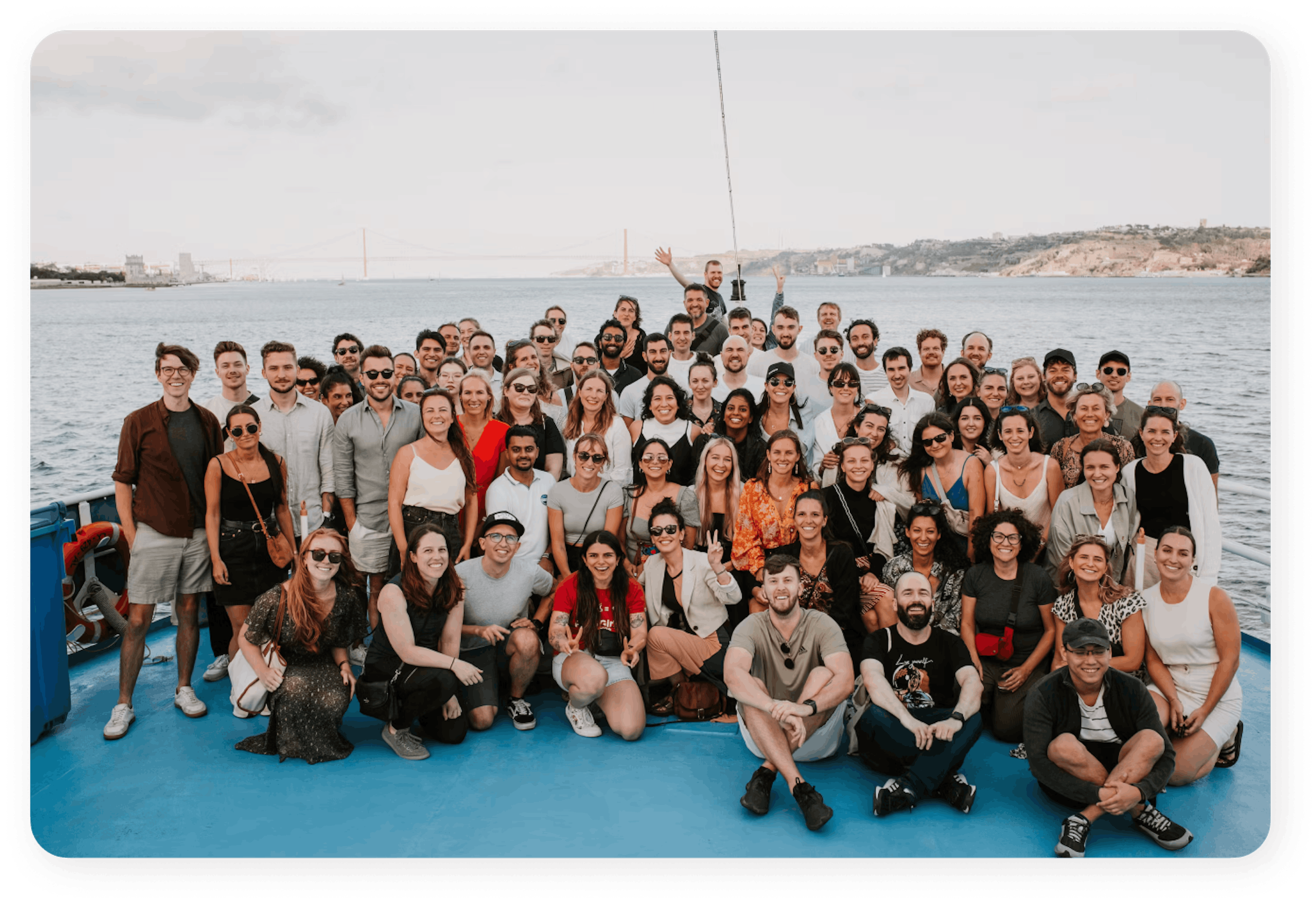 Localyze employees assembled for a group picture on a boat