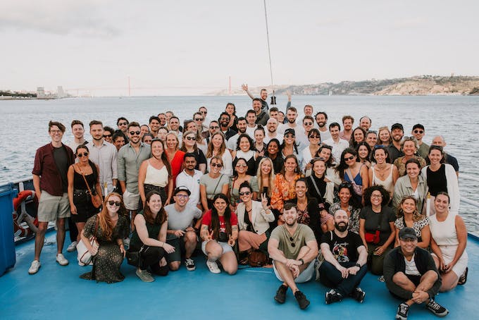 Localyze employees assembled for a group picture on a boat