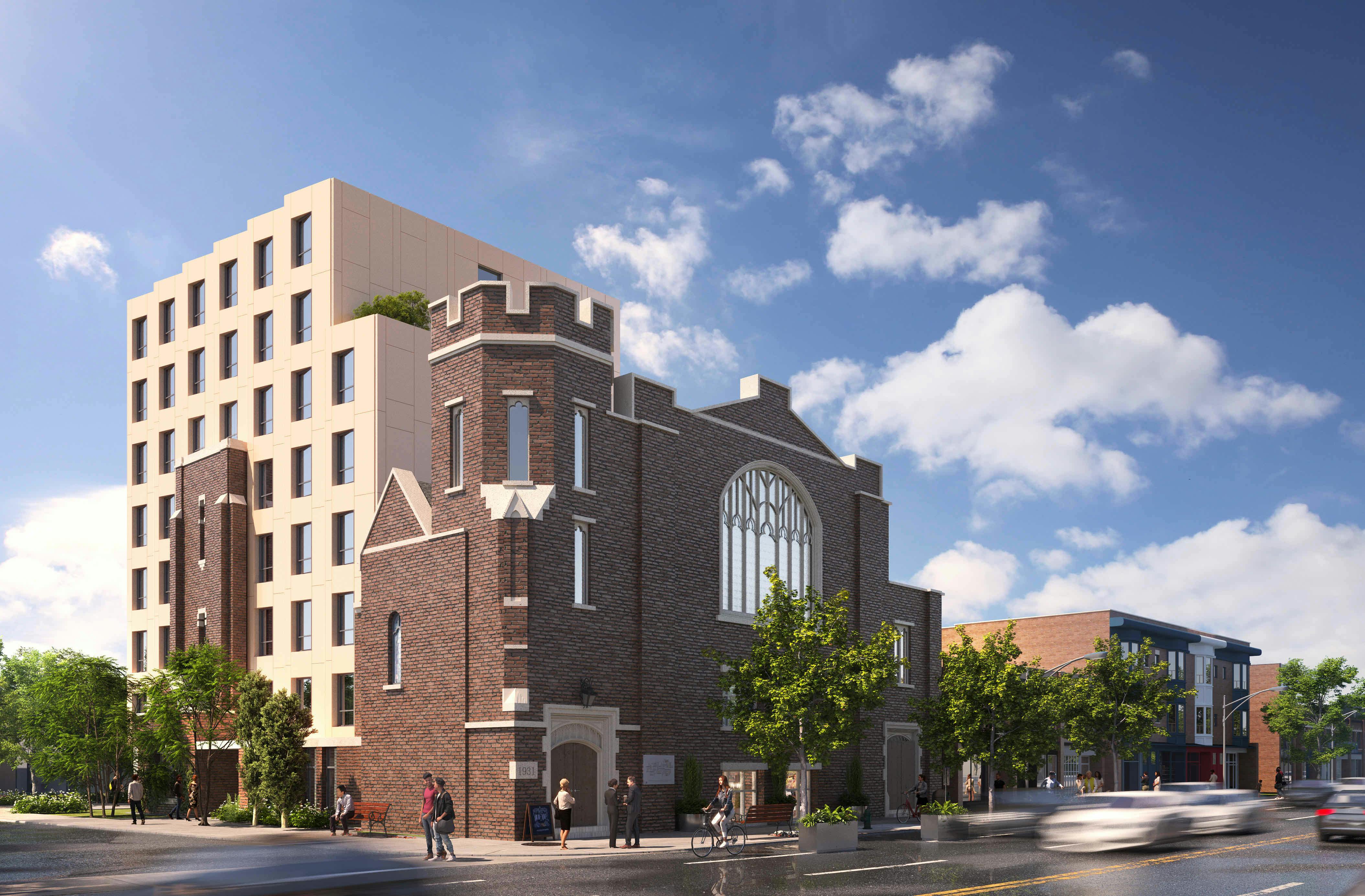 Modern multi-story building at 60 Bowden with a historic brick facade and large windows, set against a clear sky