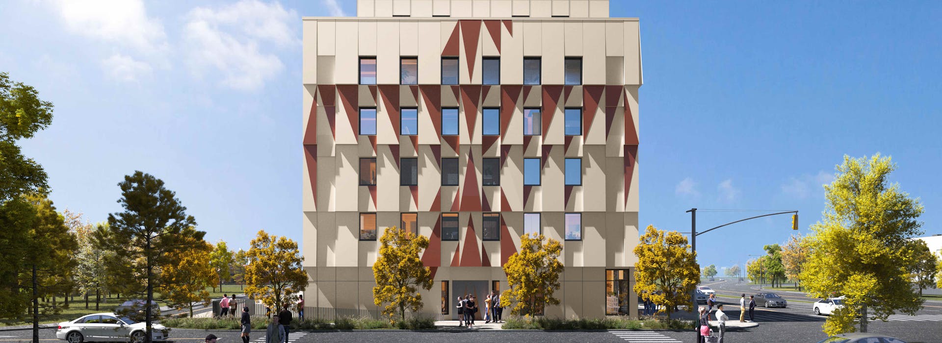 Front view of 2217 Kingston, a modern multi-story building with a unique geometric facade, surrounded by trees and a clear sky