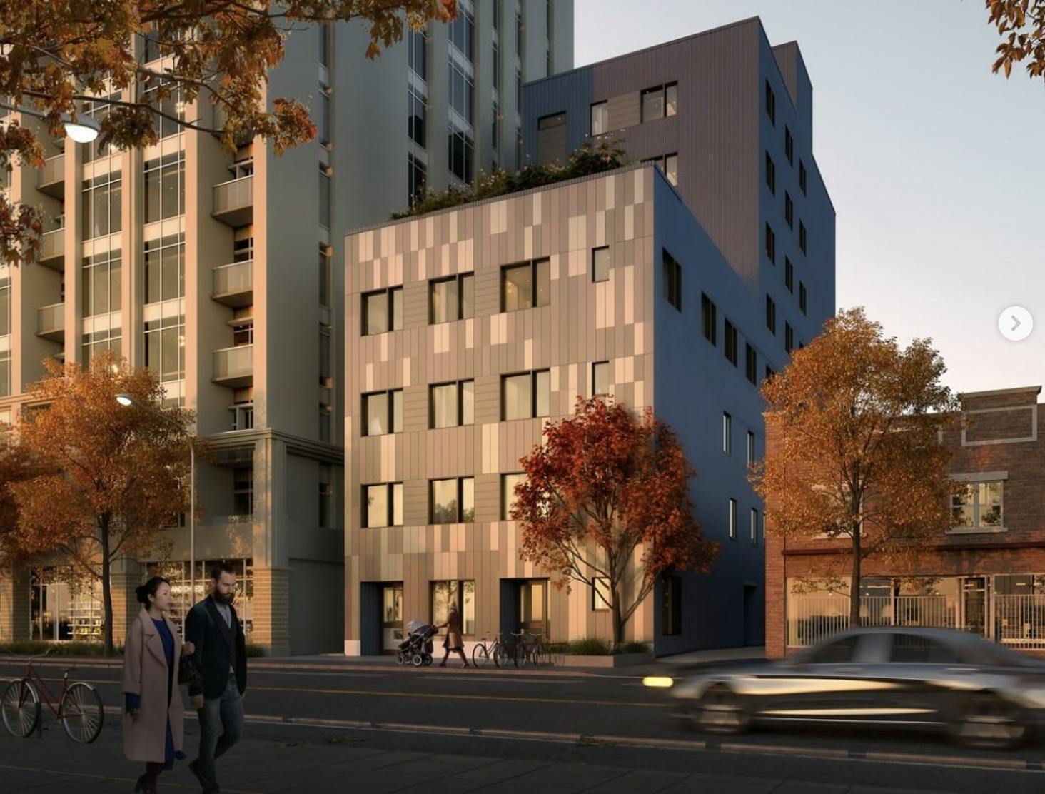 Rendered Image of completed 215 Wellesley St project. Building in Autumn overlooking a busy street with cars passing by while a couple walks passed.