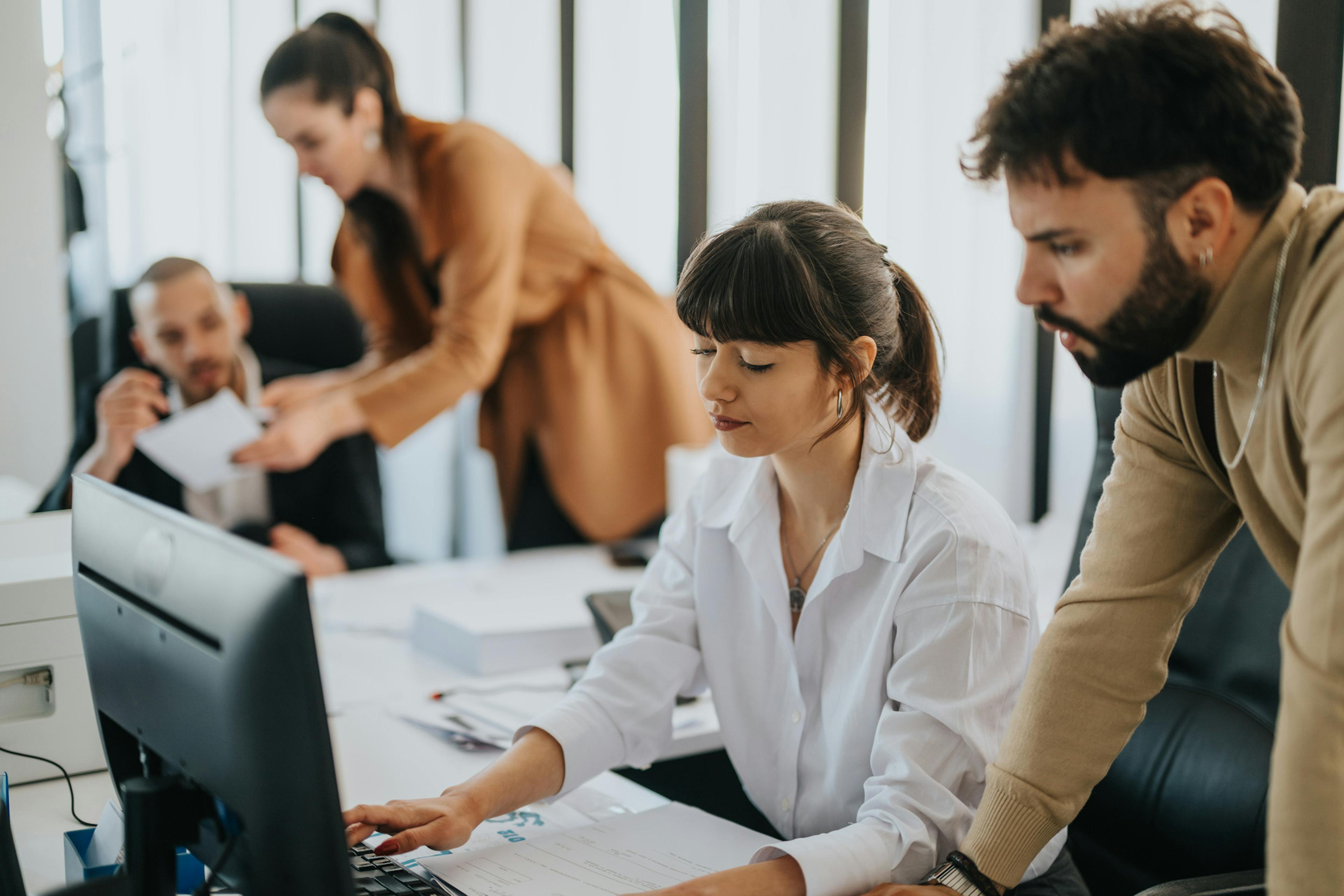 operations employees in a meeting