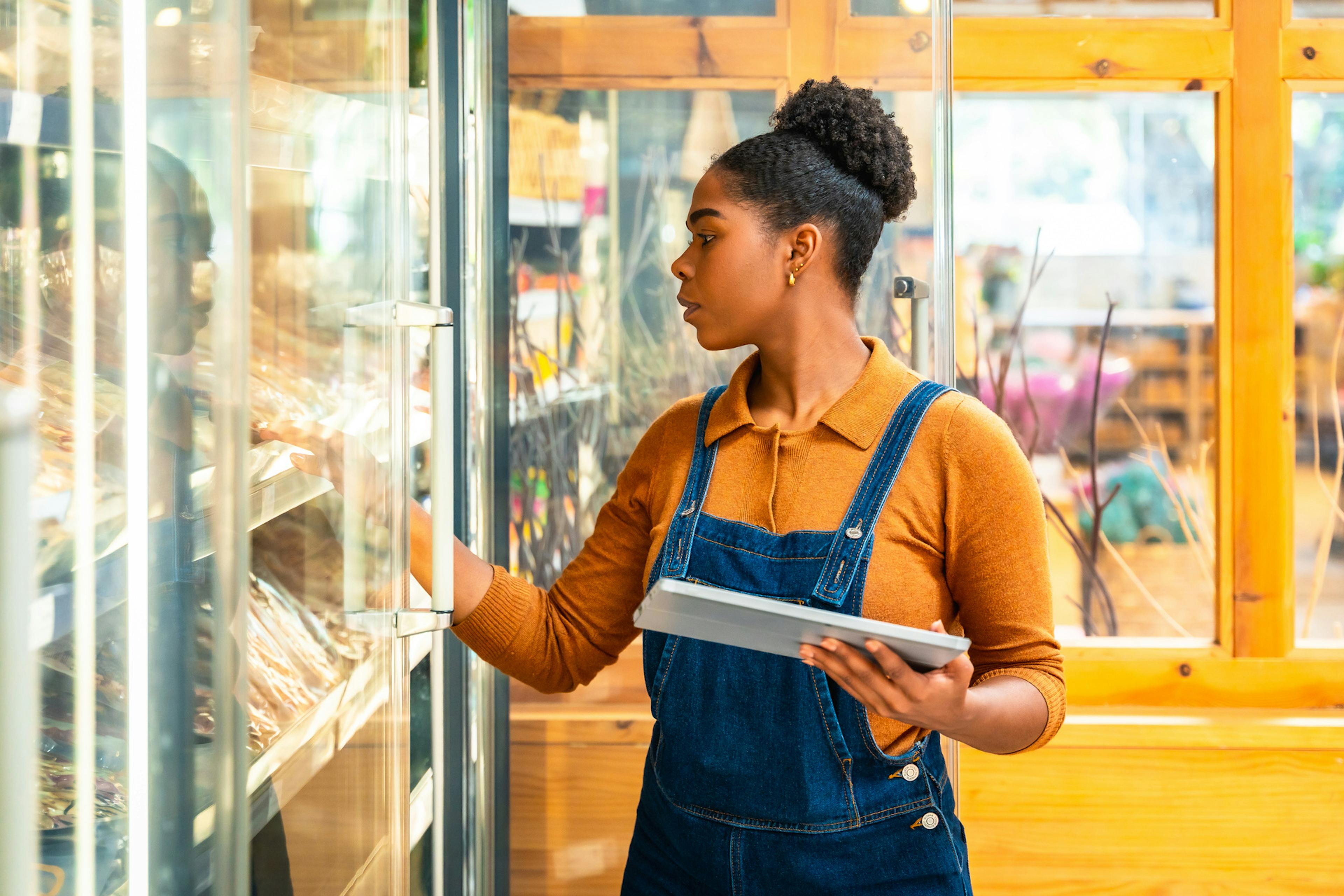 woman taking inventory