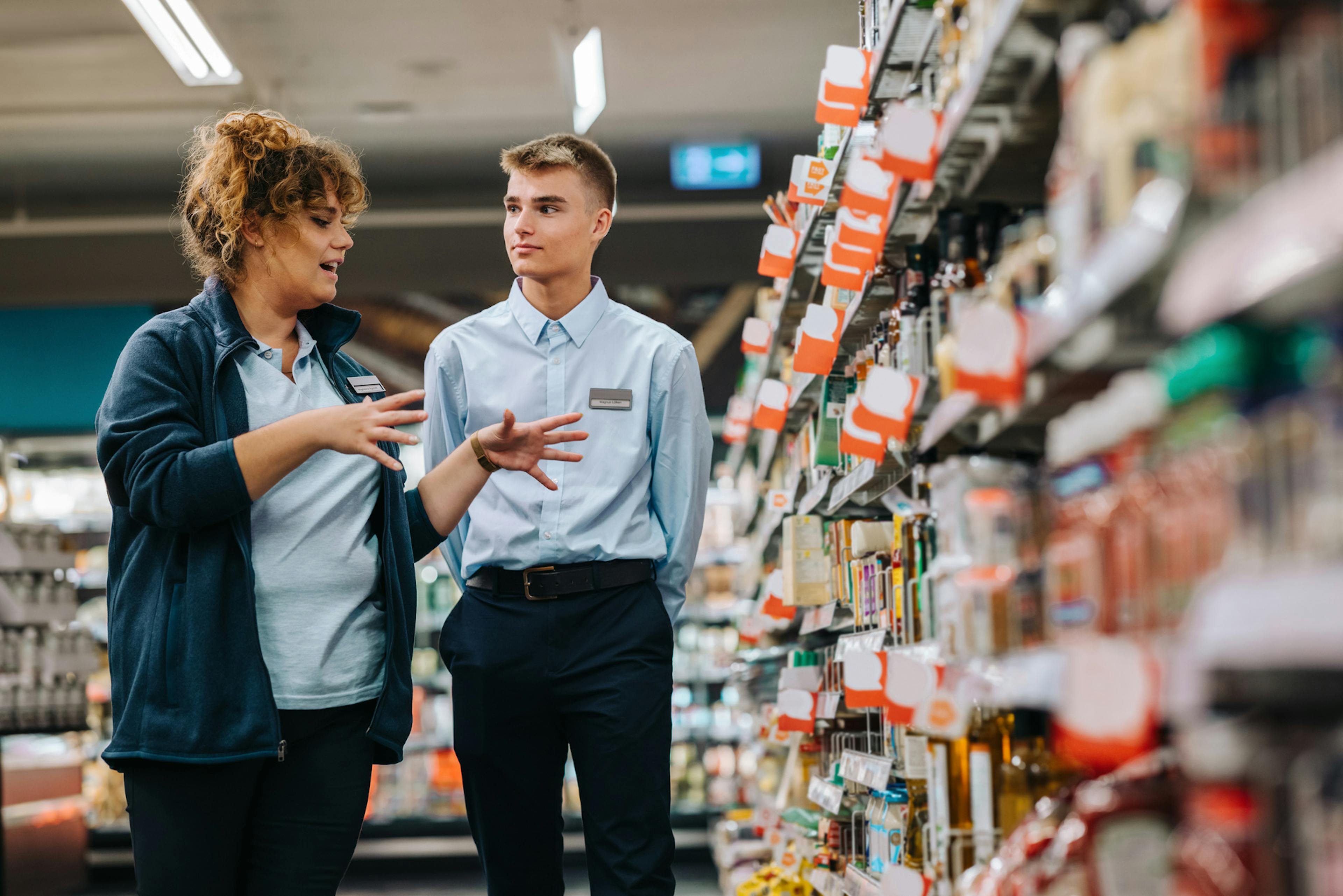 grocery workers taking inventory