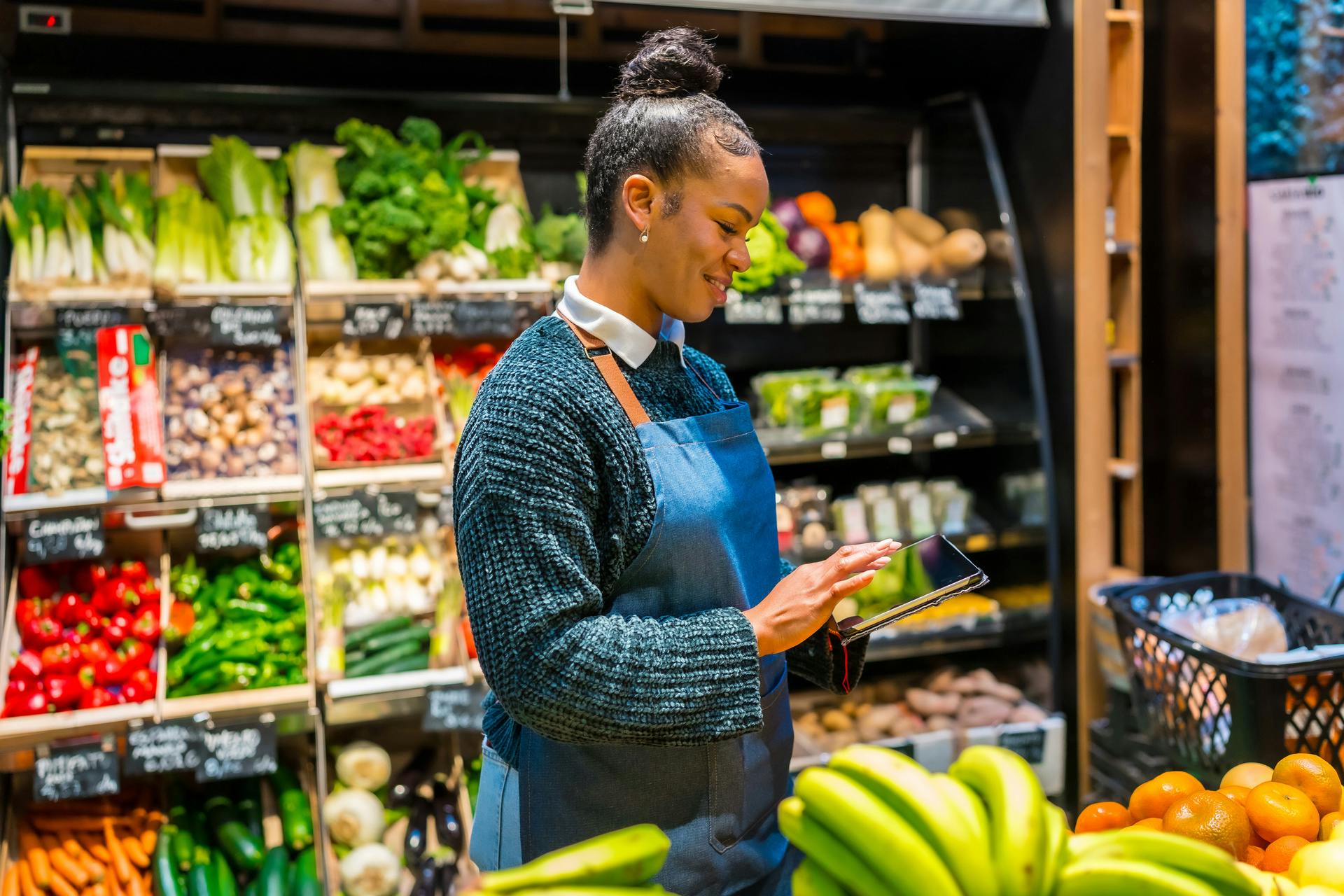 grocery employee taking stock