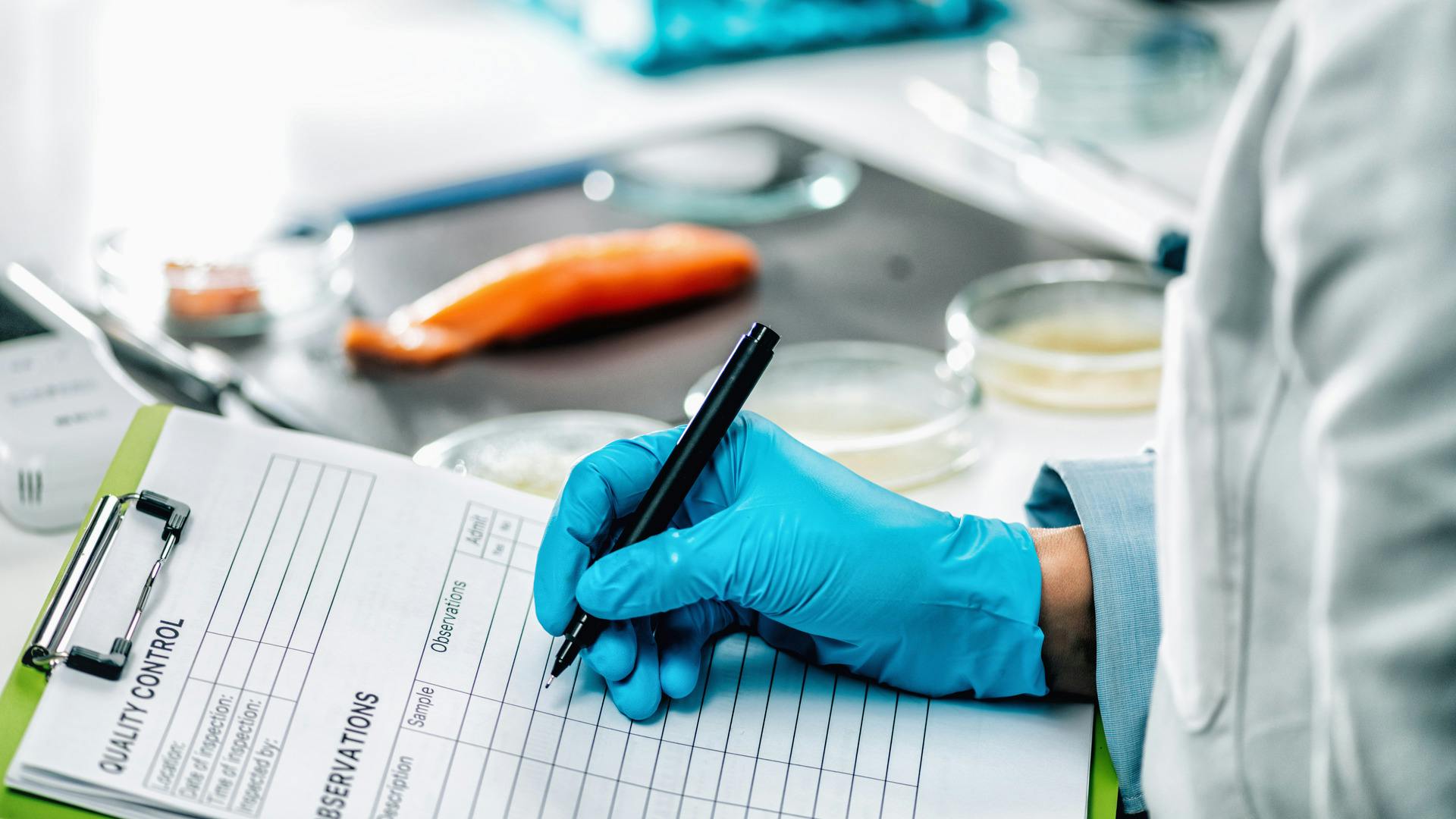 food safety employee taking notes