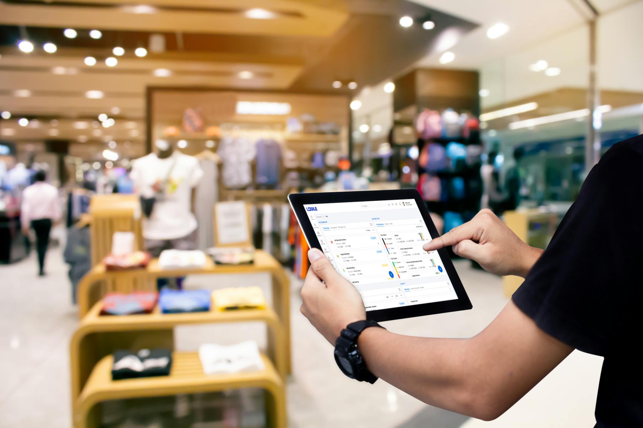 man using logile on ipad
