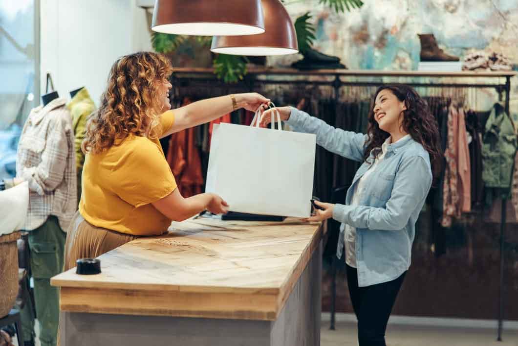 Retail-customer-having-a-delightful-experience-with-an-employee..jpg