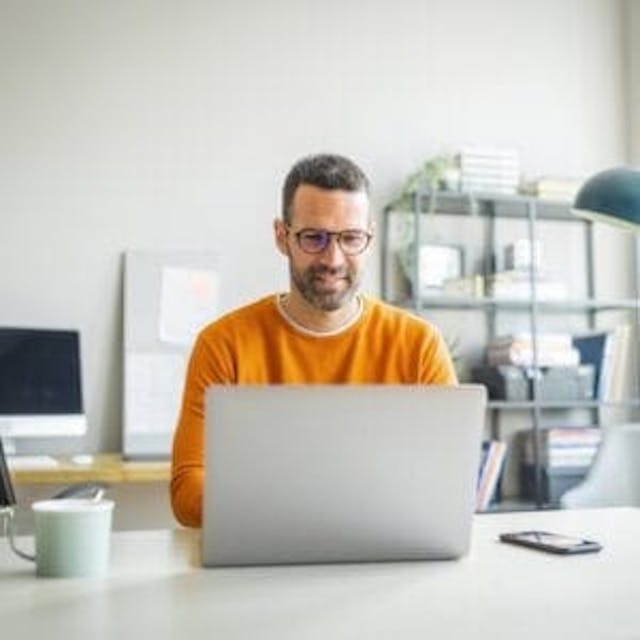 Manager on laptop