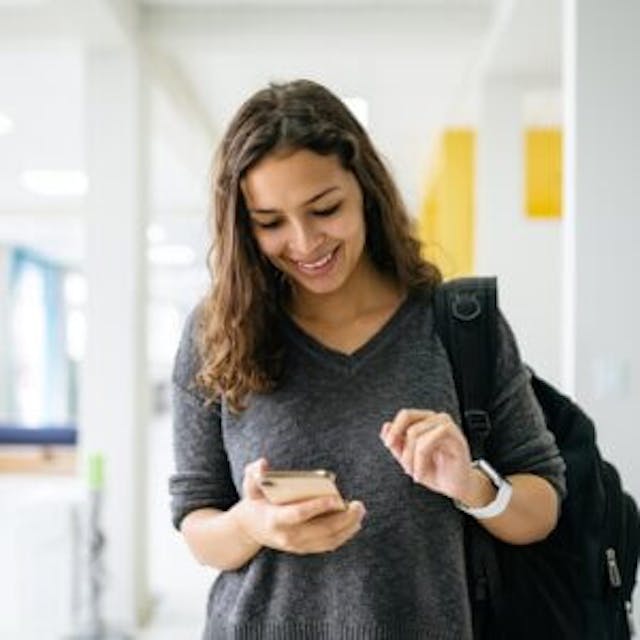 Happy associate on phone