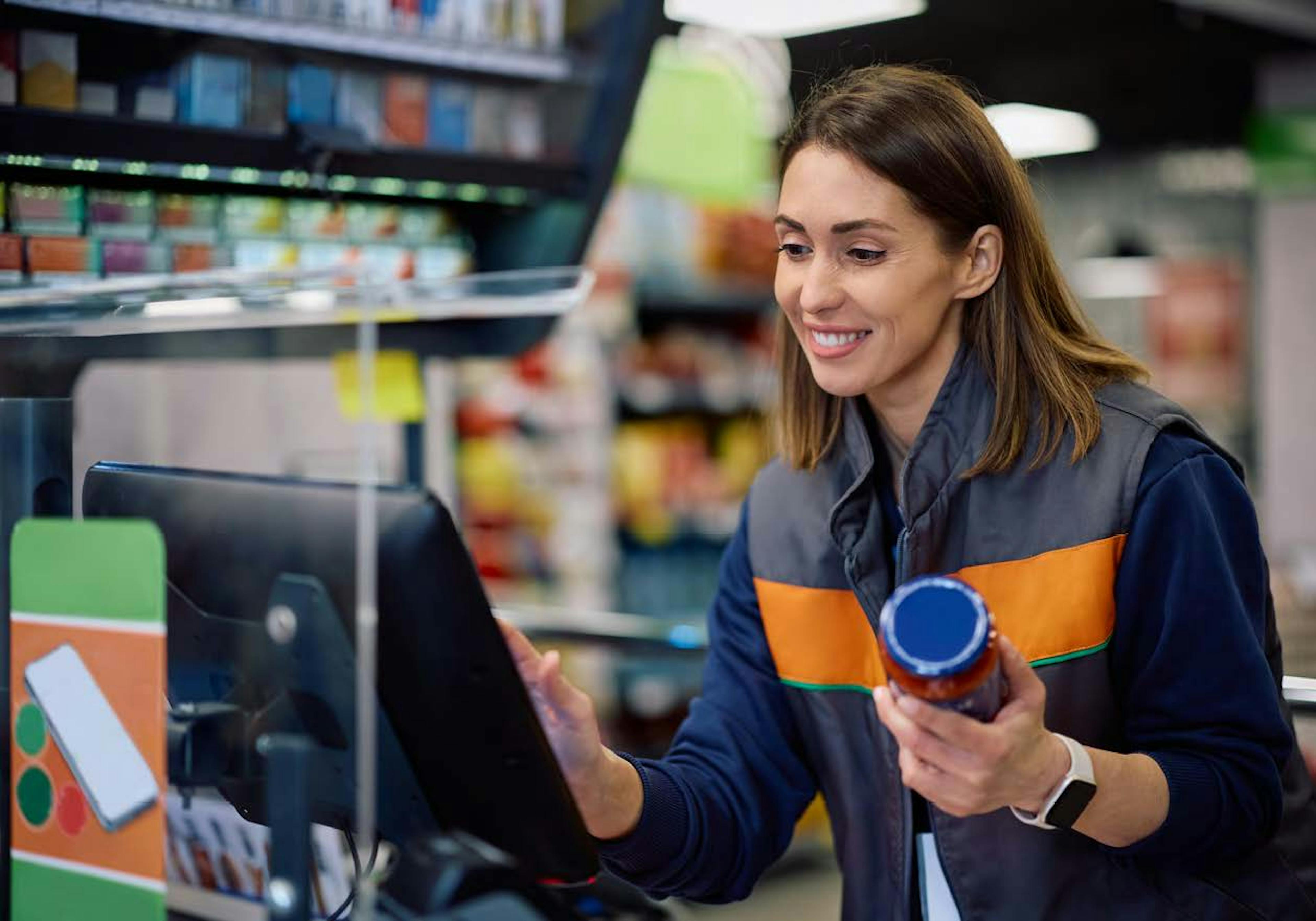 Employee ringing out products