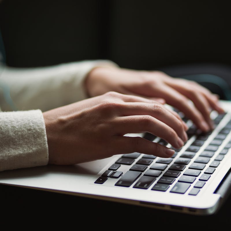 Woman working on laptop computer