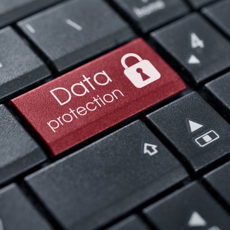Öryggishugtak, orðið „Data protection“ eða persónuvernd á hnappi lyklaborðs